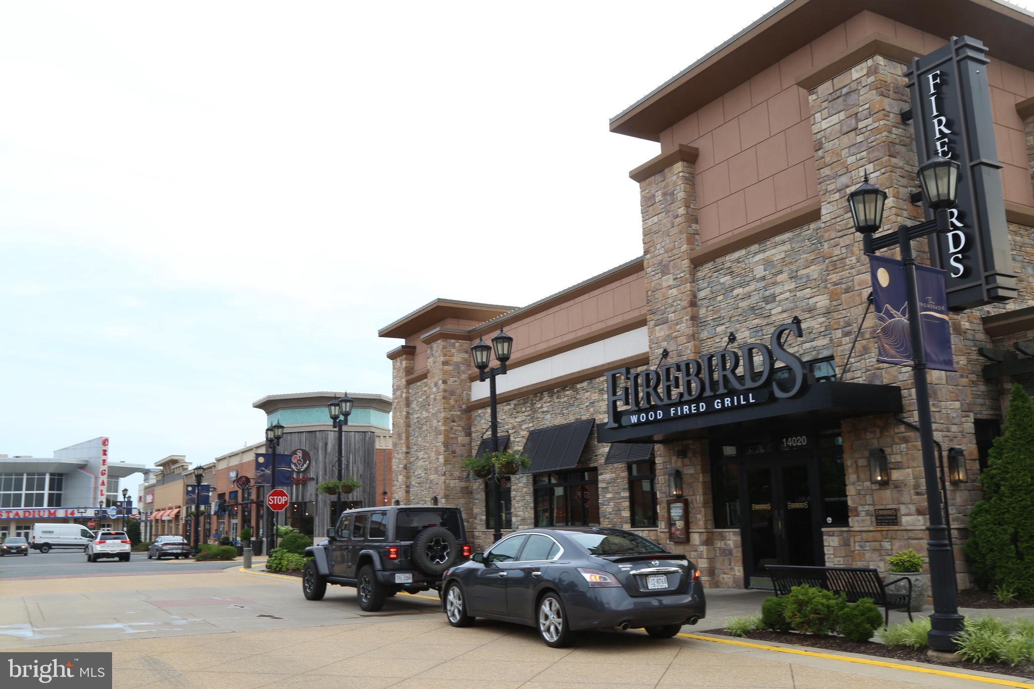 8461 Tackhouse Loop Gainesville, VA 20155 - Photo 38 of 39 a car parked in front of a building