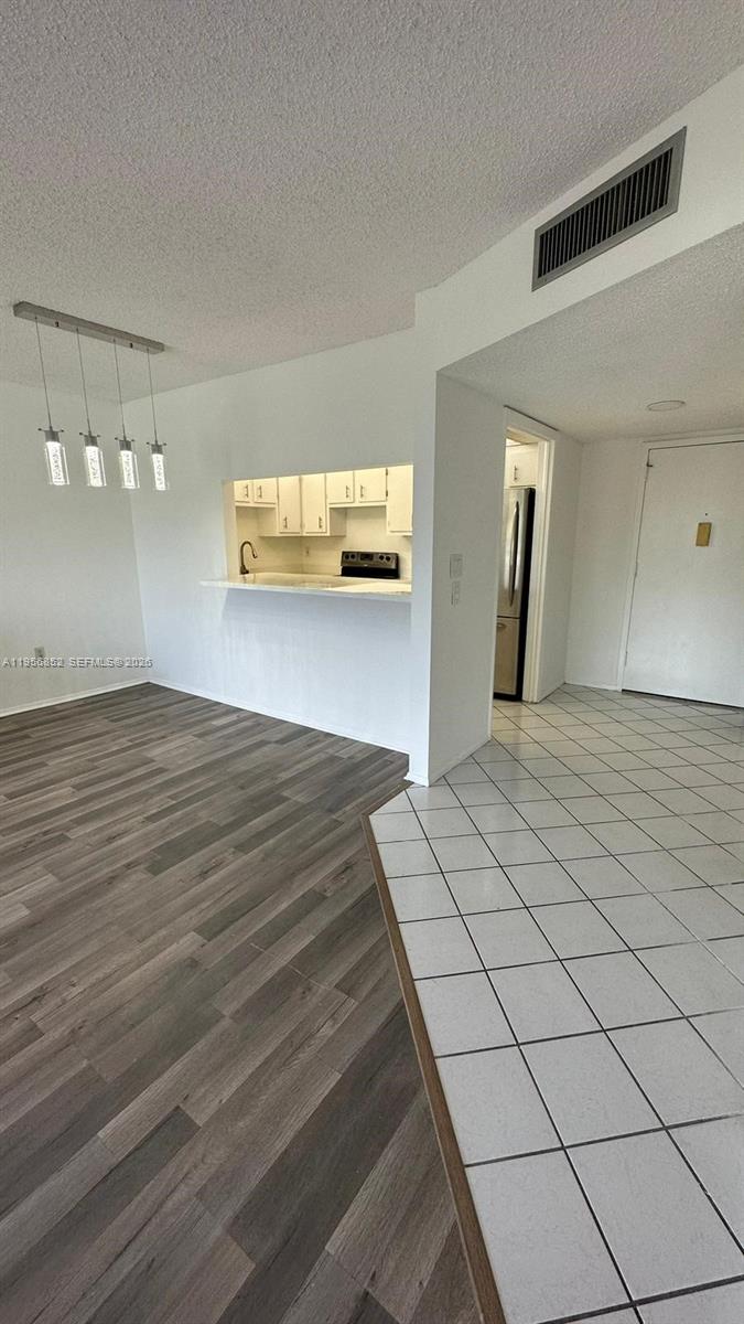 4174 Inverrary Drive, Unit 311 Lauderhill, FL 33319 - Photo 14 of 29 a view of a livingroom with a dishwasher