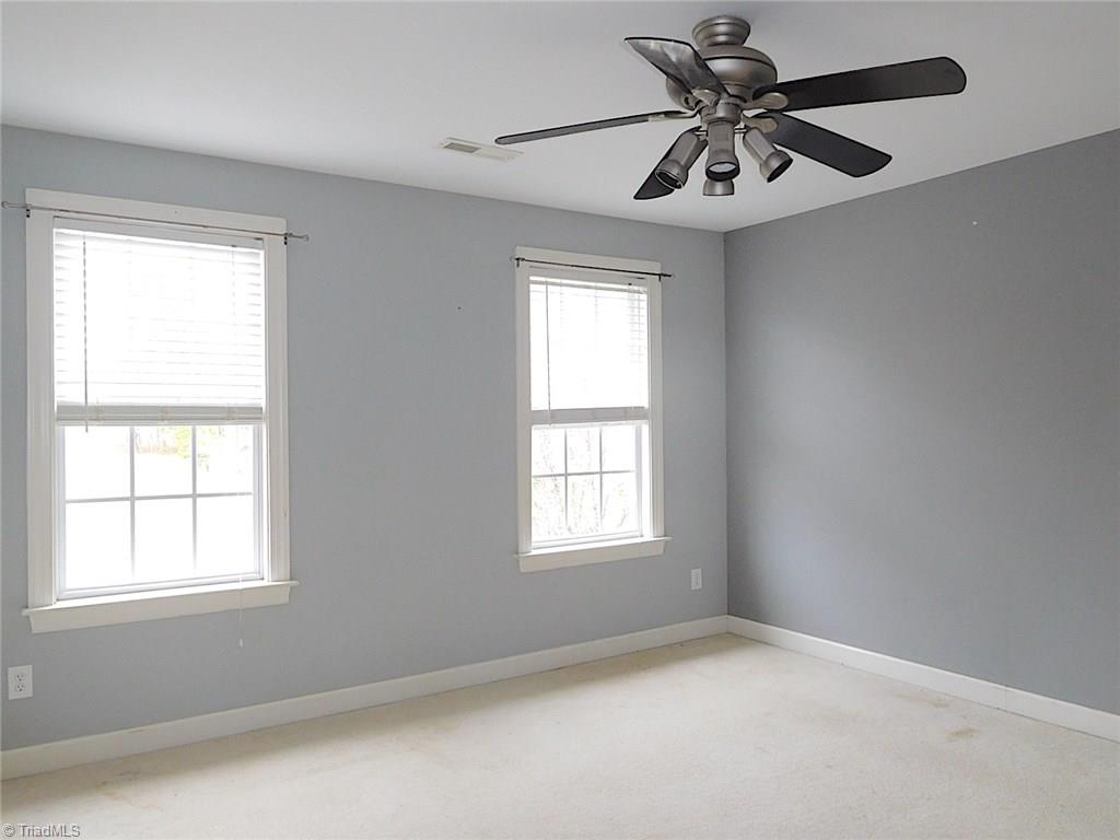 709 Number Ten Way Oak Ridge, NC 27310 - Photo 25 of 29 Bedroom 1