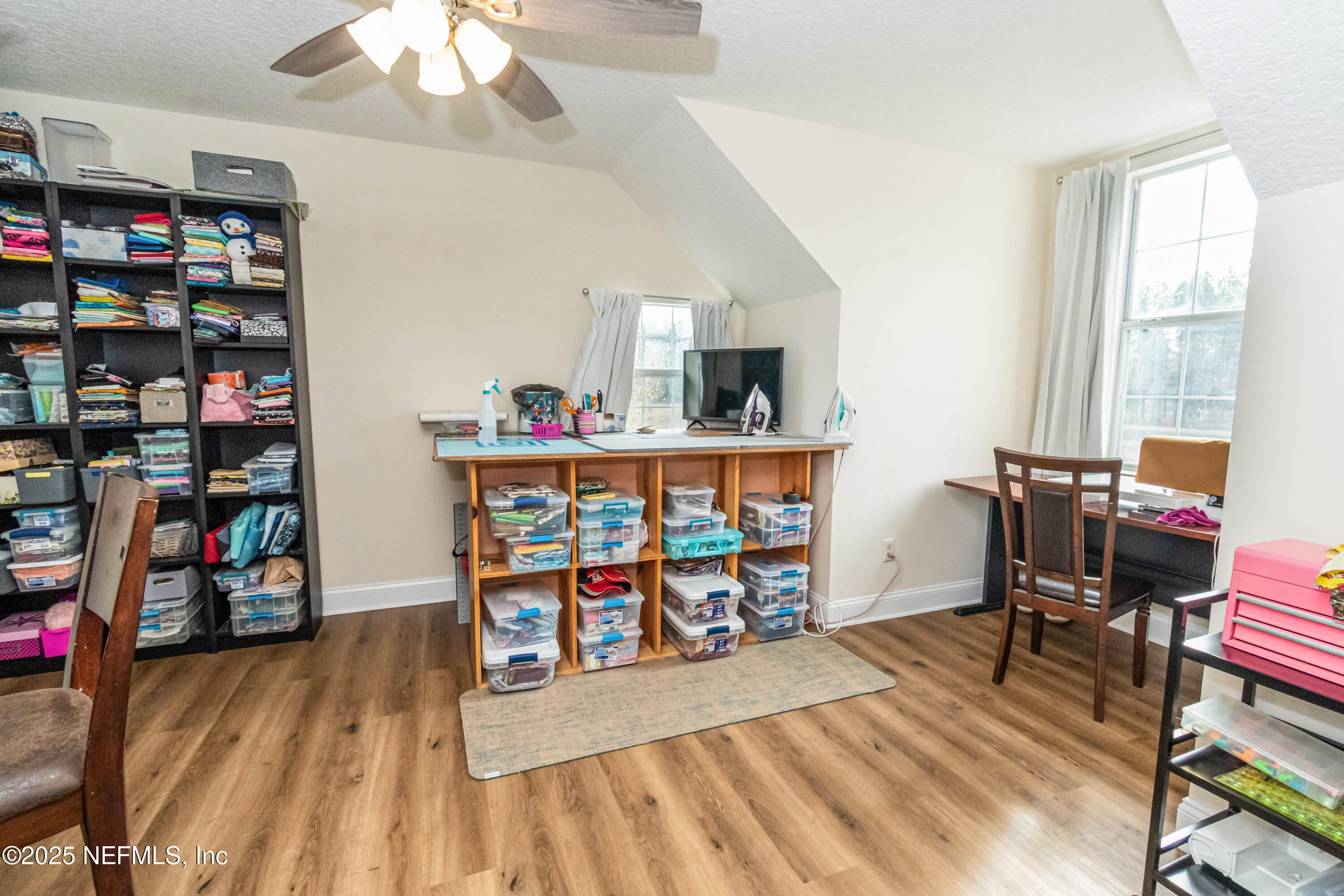 8219 Mud Lake Road Macclenny, FL 32063 - Photo 48 of 105 a reading room with lots of furniture and toys