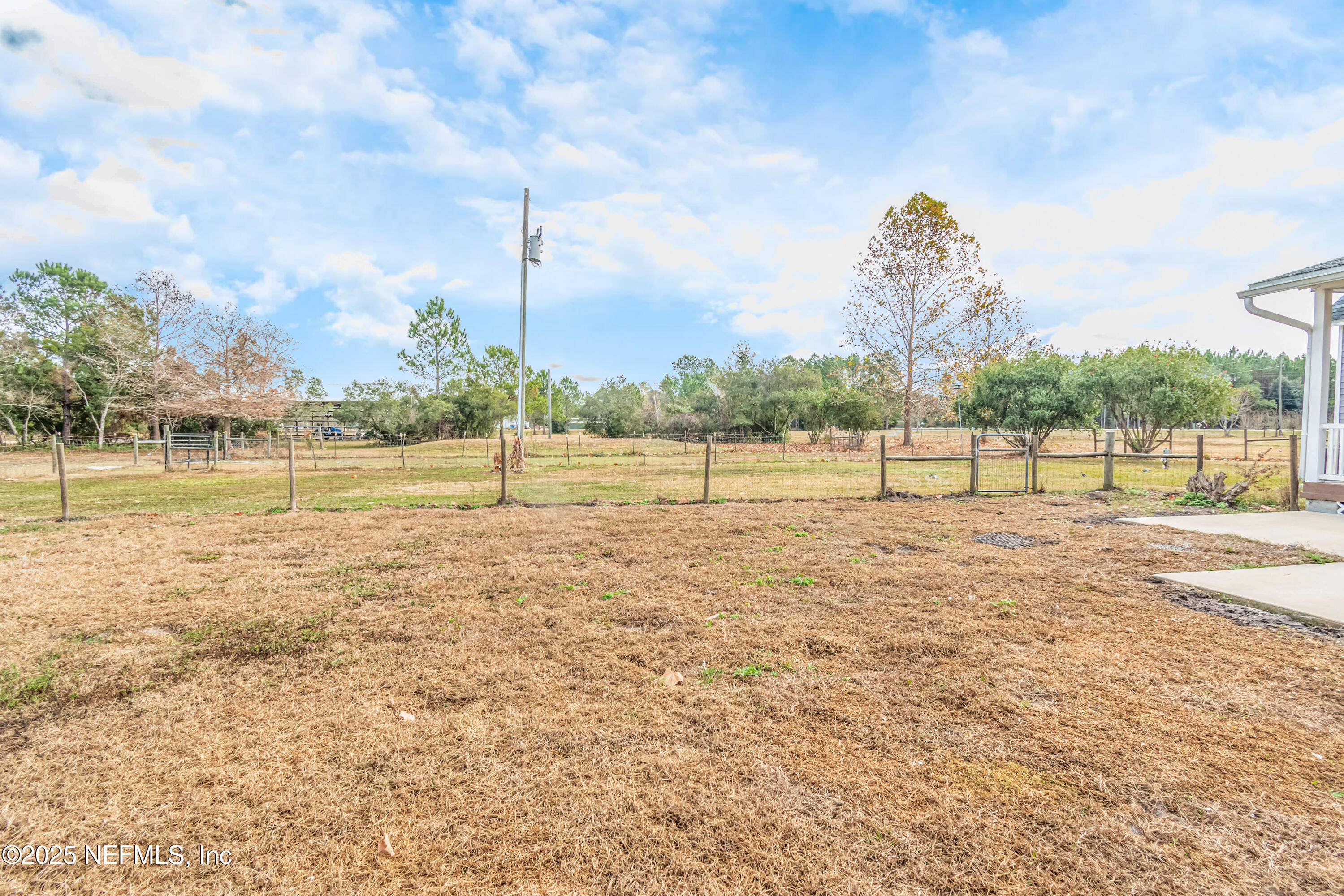 8219 Mud Lake Road Macclenny, FL 32063 - Photo 98 of 105 a view of a lake with a big yard
