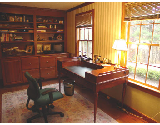 50 Meadow Road Bolton, MA 01740 - Photo 4 of 9 a table and chairs in a room next to a window