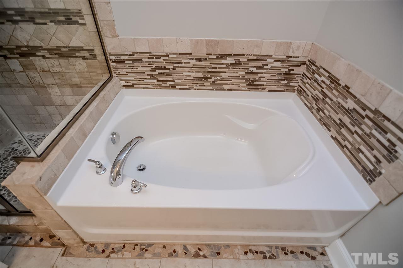 3020 Settle In Lane Raleigh, NC 27614 - Photo 13 of 25 Tub w/ Tile Surround
