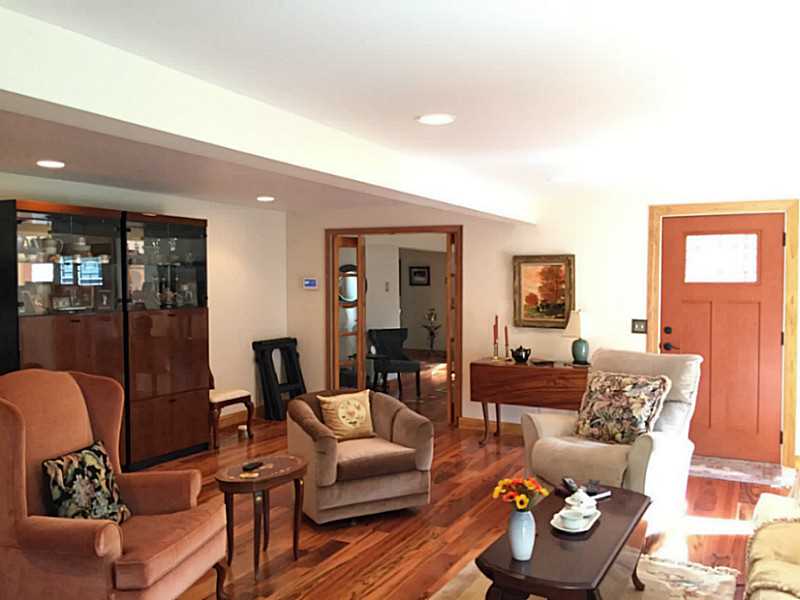 63 Mason Road Barrington, RI 02806 - Photo 4 of 22 Den/Family/Great Room. Fabulous entertaining family room with gas fireplace and beautiful floors.
