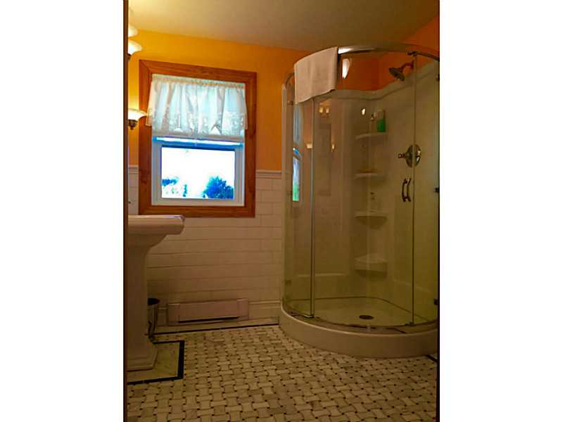 63 Mason Road Barrington, RI 02806 - Photo 8 of 22 Master Bath/Spa. Terrific corner shower stall with pedestal sink and great storage cabinet space.