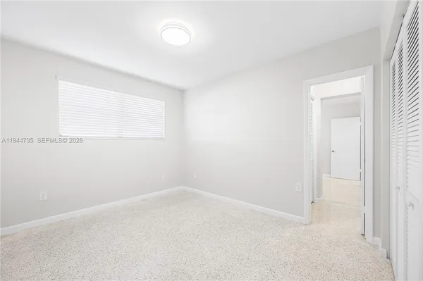 an empty room with a window