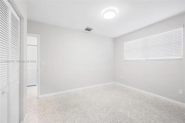 an empty room with a window