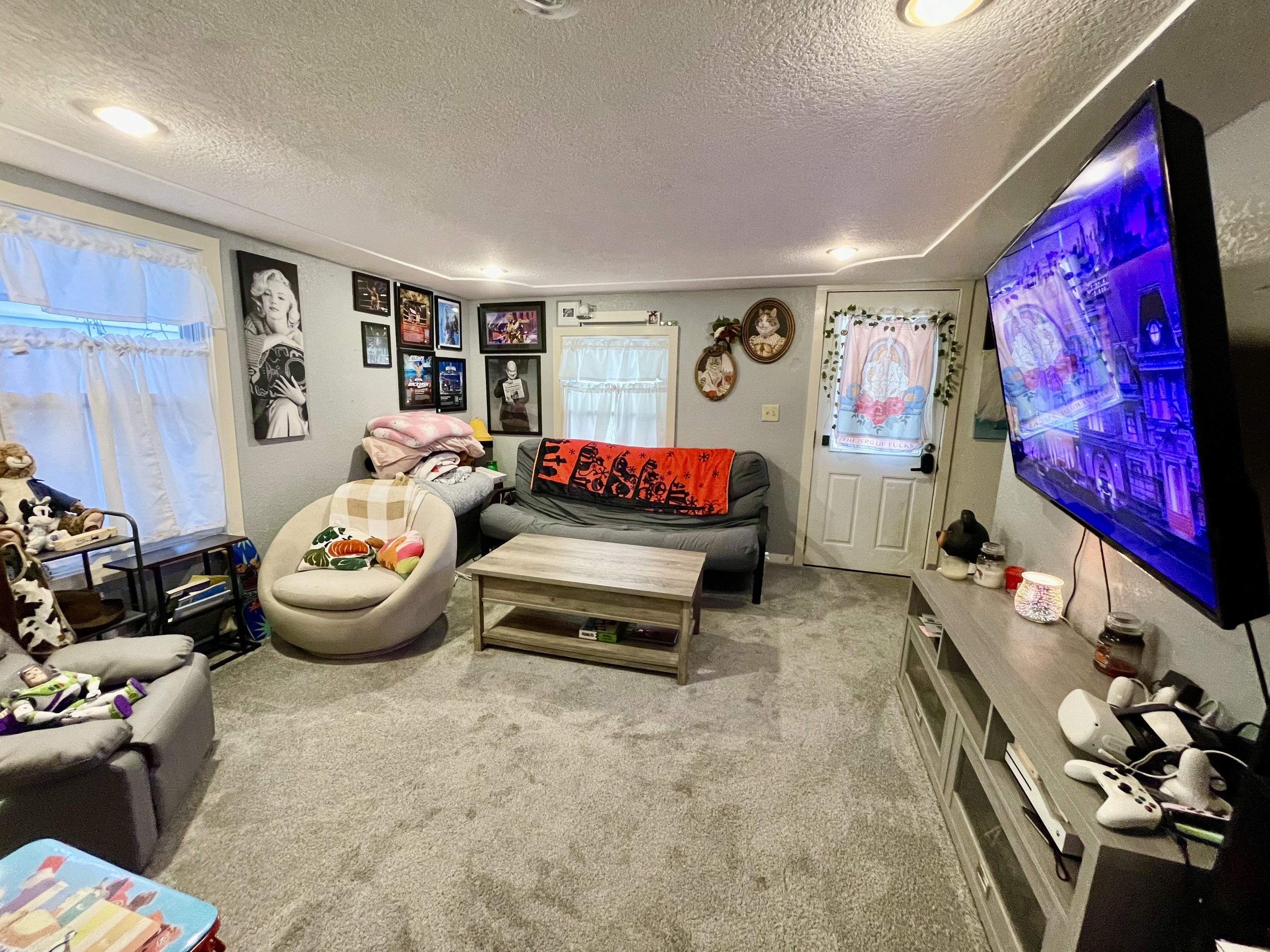 8 Oak Street Winchester, CT 06098 - Photo 3 of 11 a living room with furniture and wall paintings