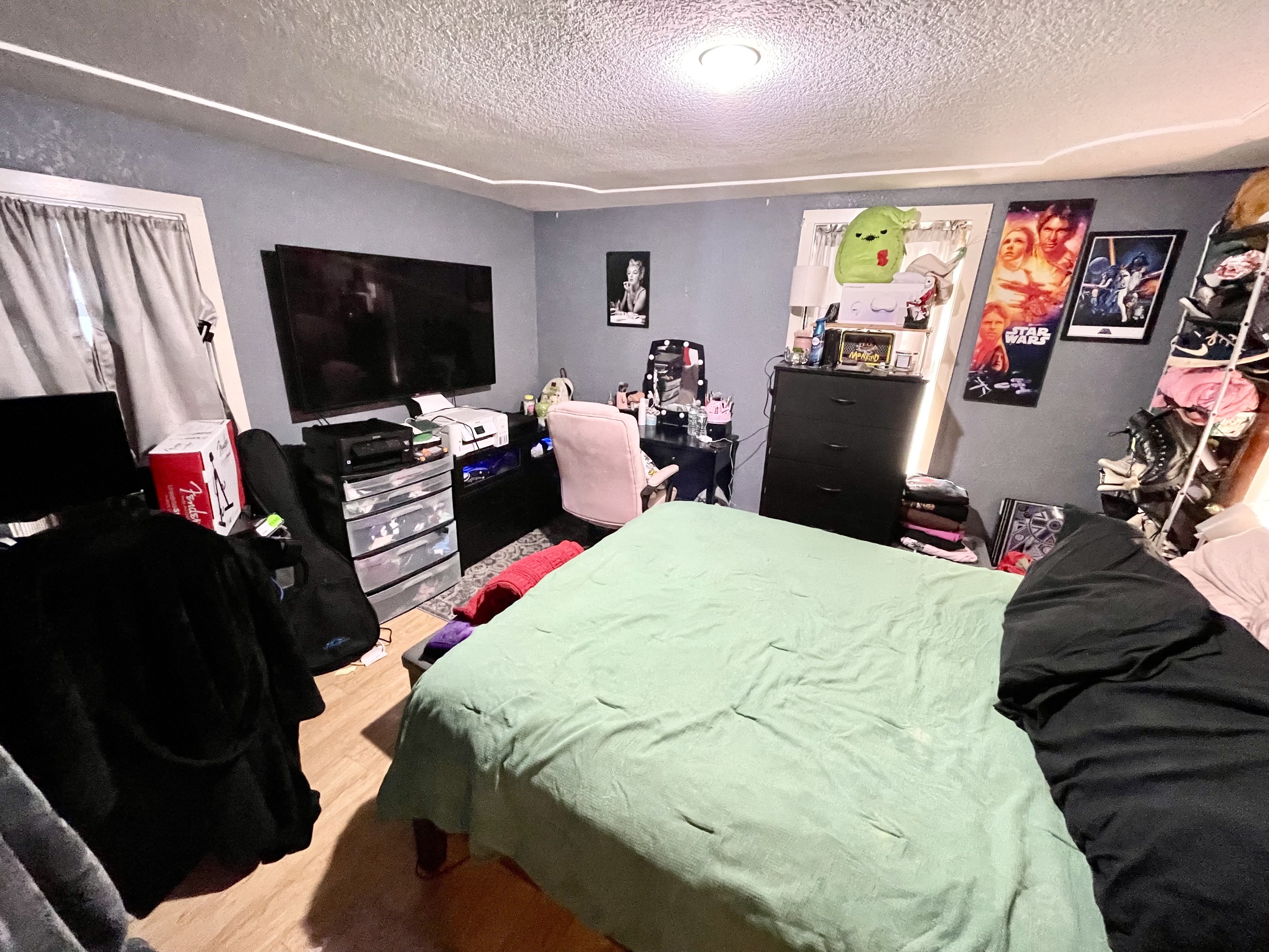 8 Oak Street Winchester, CT 06098 - Photo 8 of 11 a bed room with a bed window and a flat screen tv