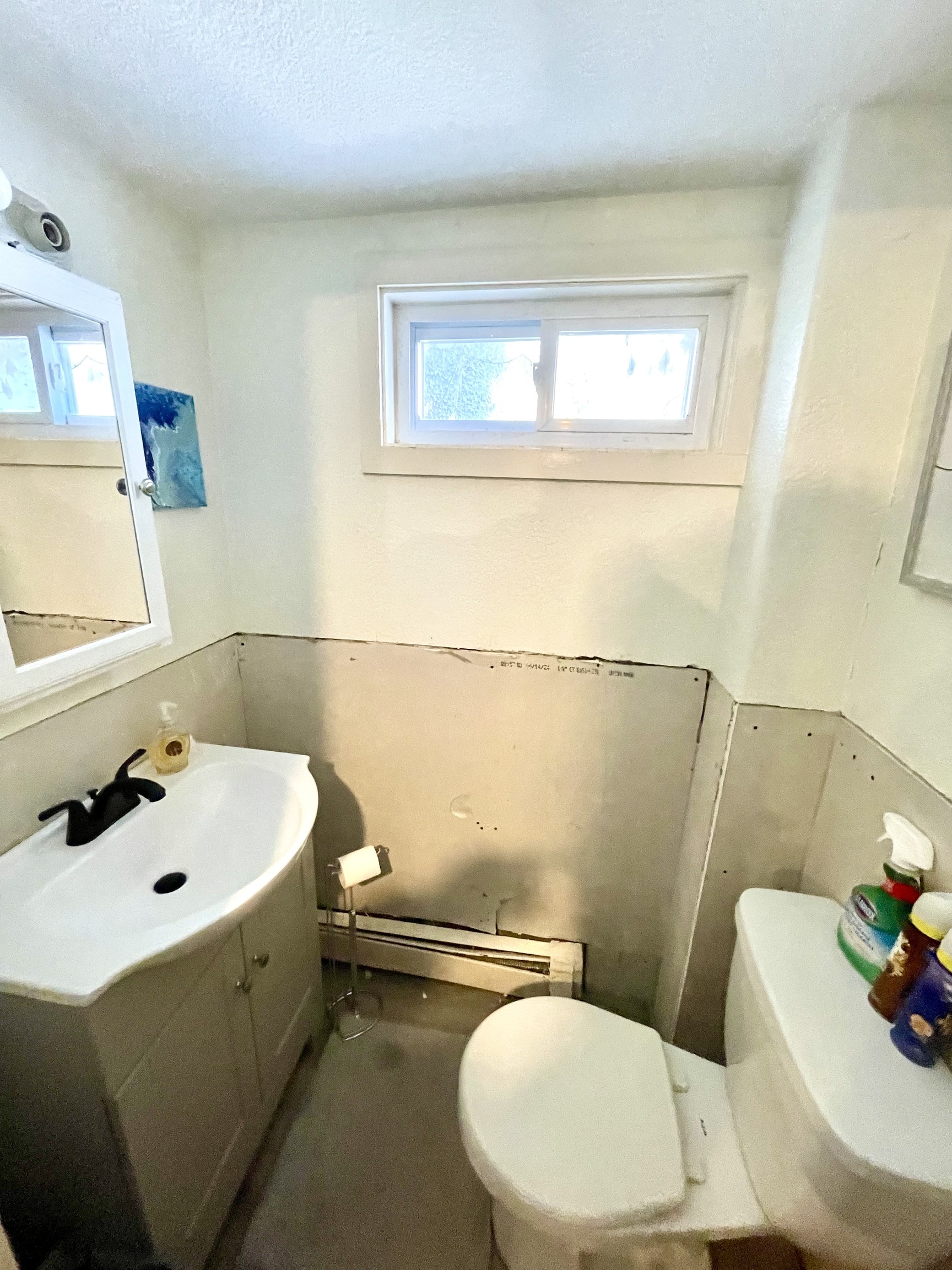 8 Oak Street Winchester, CT 06098 - Photo 9 of 11 a bathroom with a sink and a mirror