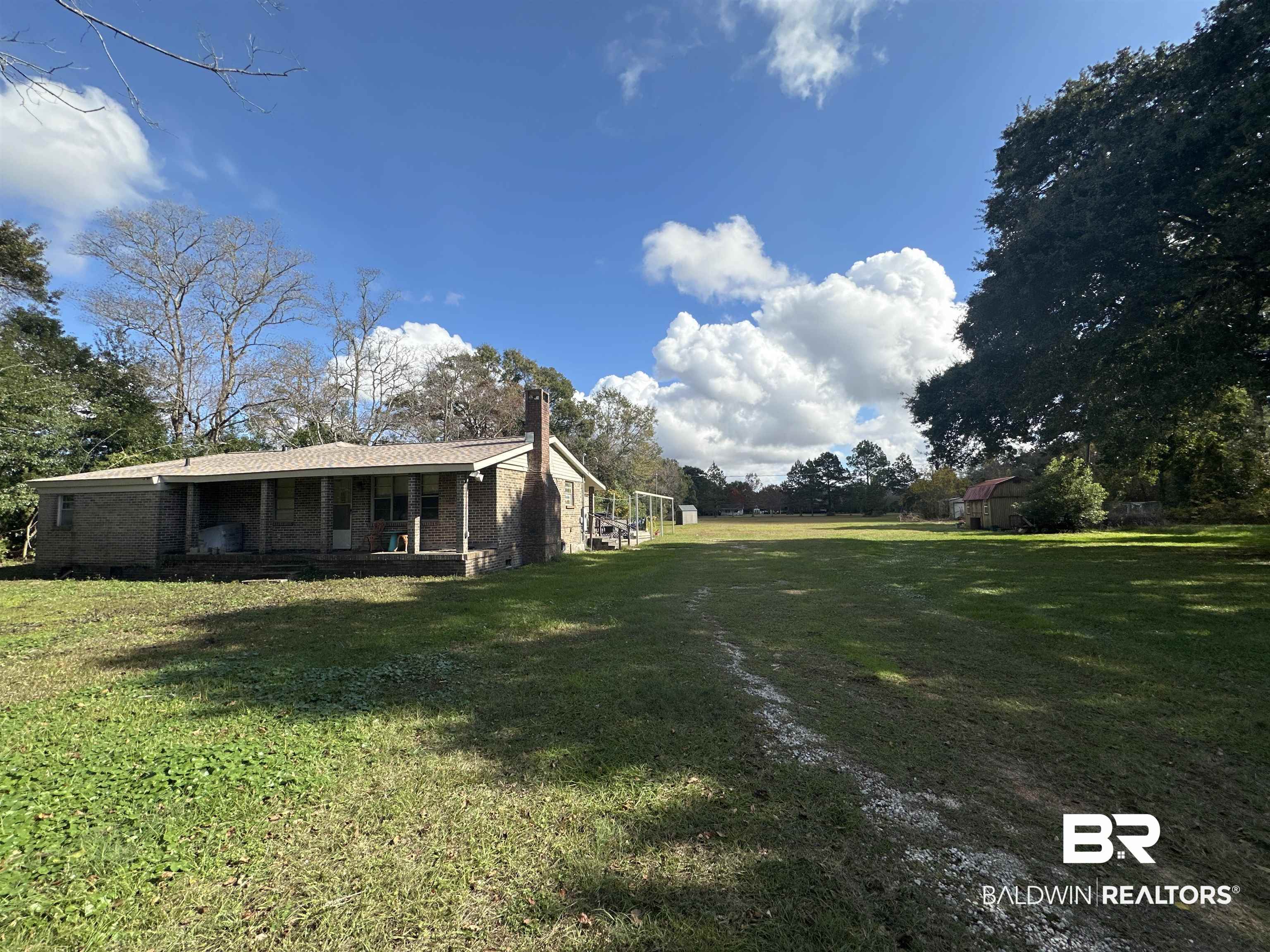 9520 C Four Mile Road Irvington, AL 36544 - Photo 1 of 32 View of yard
