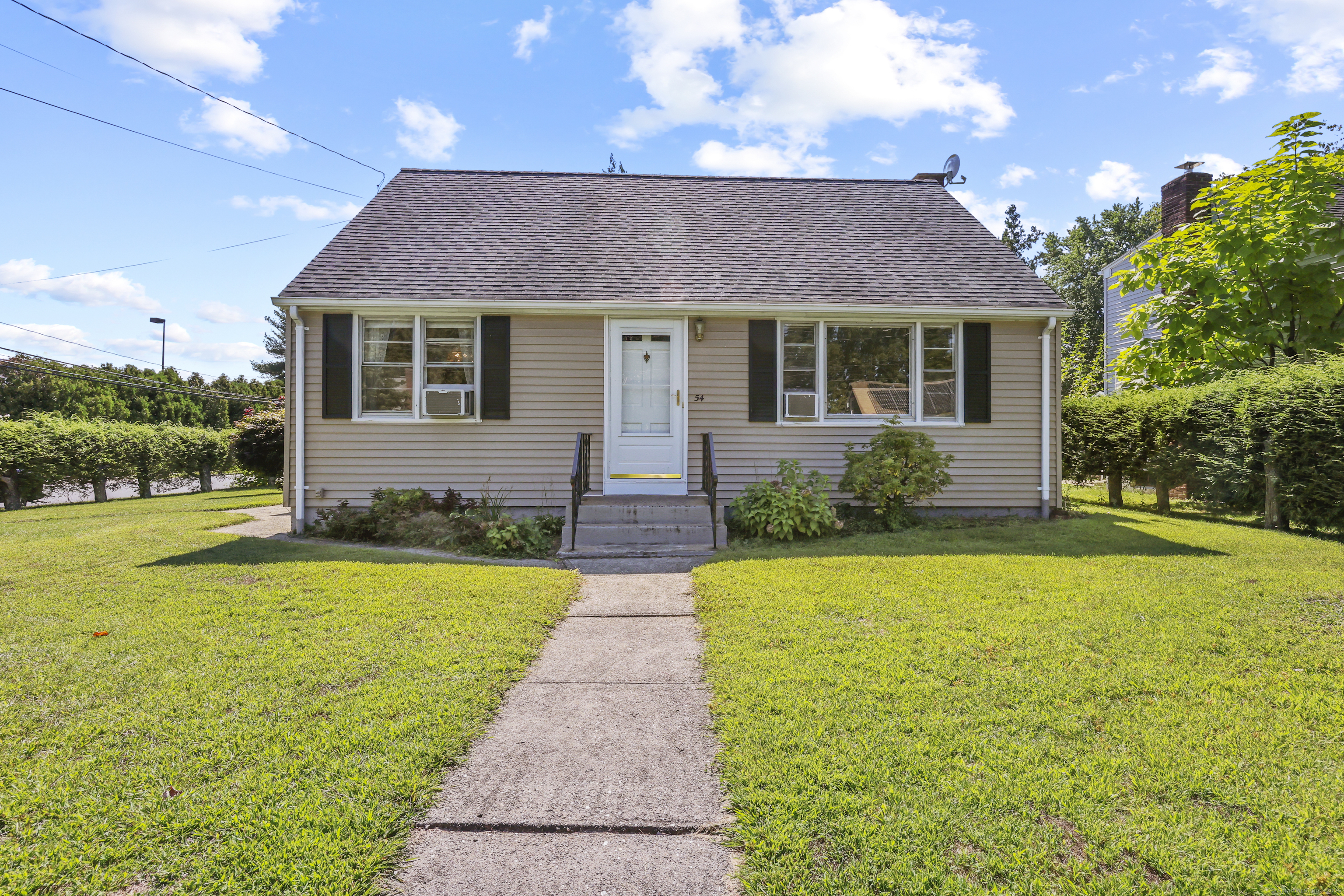 54 Vance Road Bristol, CT 06010 - Photo 1 of 1 a front view of house with yard and trees