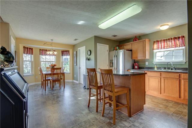1898 Portway Road Spring Hill, TN 37174 - Photo 8 of 20 Kitchen view from front to eat in kitchen area