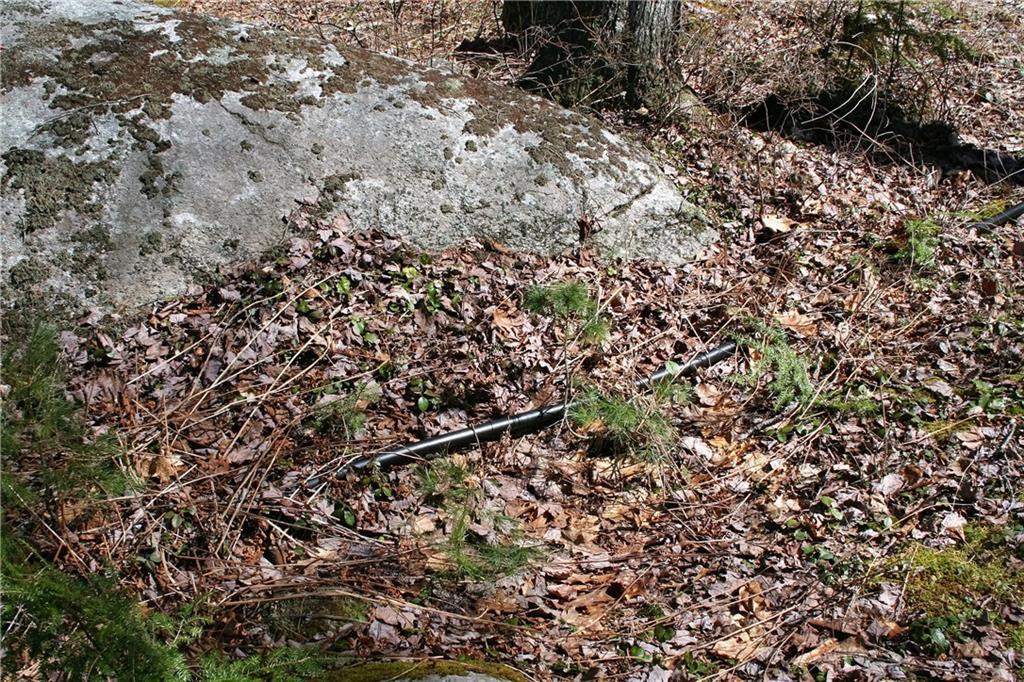 27 Beaver Dam Road Harrison, ME 04040 - Photo 25 of 27 The black water pipe from pond leads...