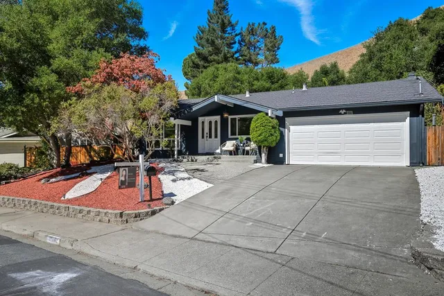 a front view of a house with entertaining space