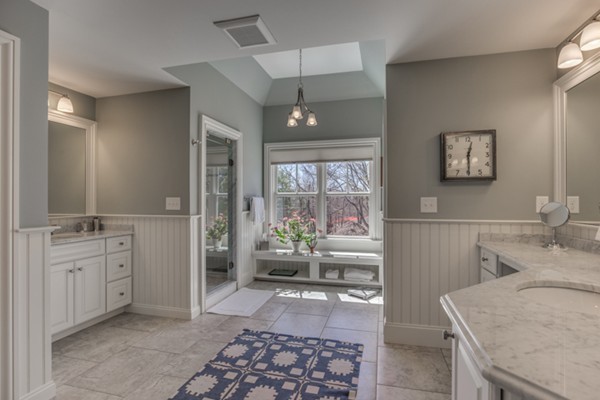 32 Whipple Road Lexington, MA 02420 - Photo 21 of 30 a room with a couch and a stove top oven