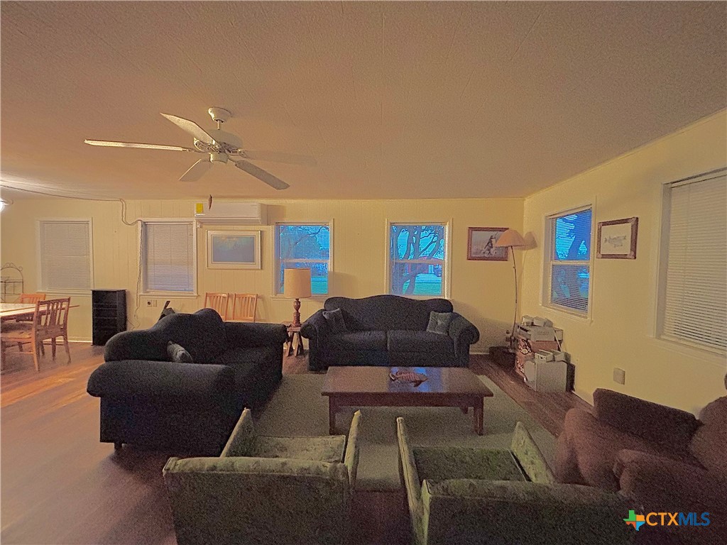 1008 Adams Avenue Port O'Connor, TX 77982 - Photo 15 of 43 a living room with furniture and a couch