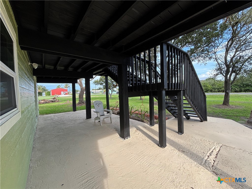 1008 Adams Avenue Port O'Connor, TX 77982 - Photo 21 of 43 a view of a porch with furniture and a yard