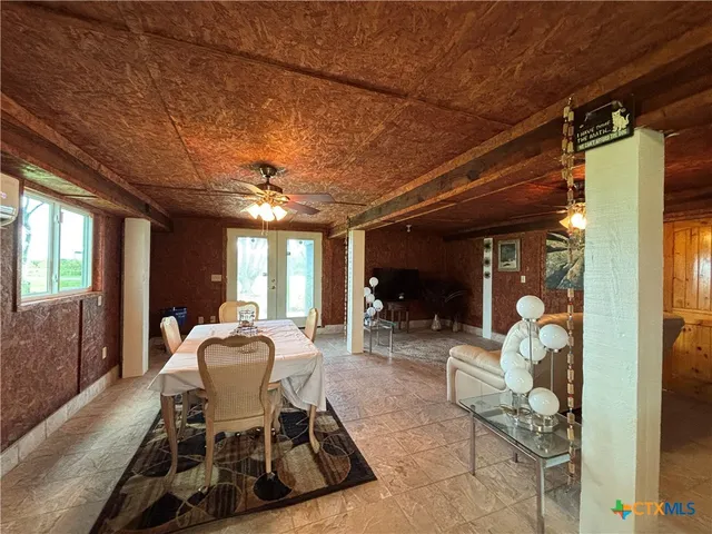 a living room with a couch and a flat screen tv