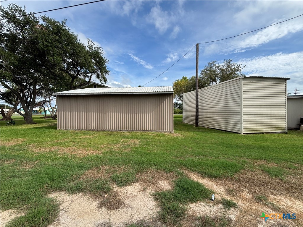 1008 Adams Avenue Port O'Connor, TX 77982 - Photo 3 of 43 a view of a backyard with a garden