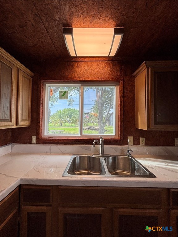 1008 Adams Avenue Port O'Connor, TX 77982 - Photo 31 of 43 a kitchen with a sink and a window