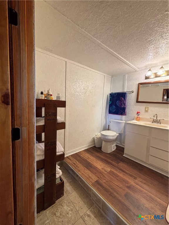 1008 Adams Avenue Port O'Connor, TX 77982 - Photo 35 of 43 a spacious bathroom with a toilet sink and shower