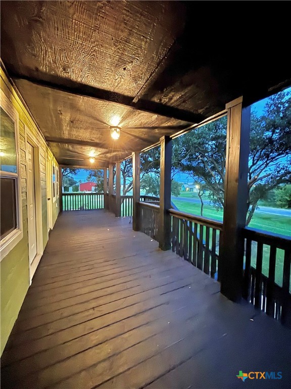 1008 Adams Avenue Port O'Connor, TX 77982 - Photo 7 of 43 a view of a porch with wooden floor