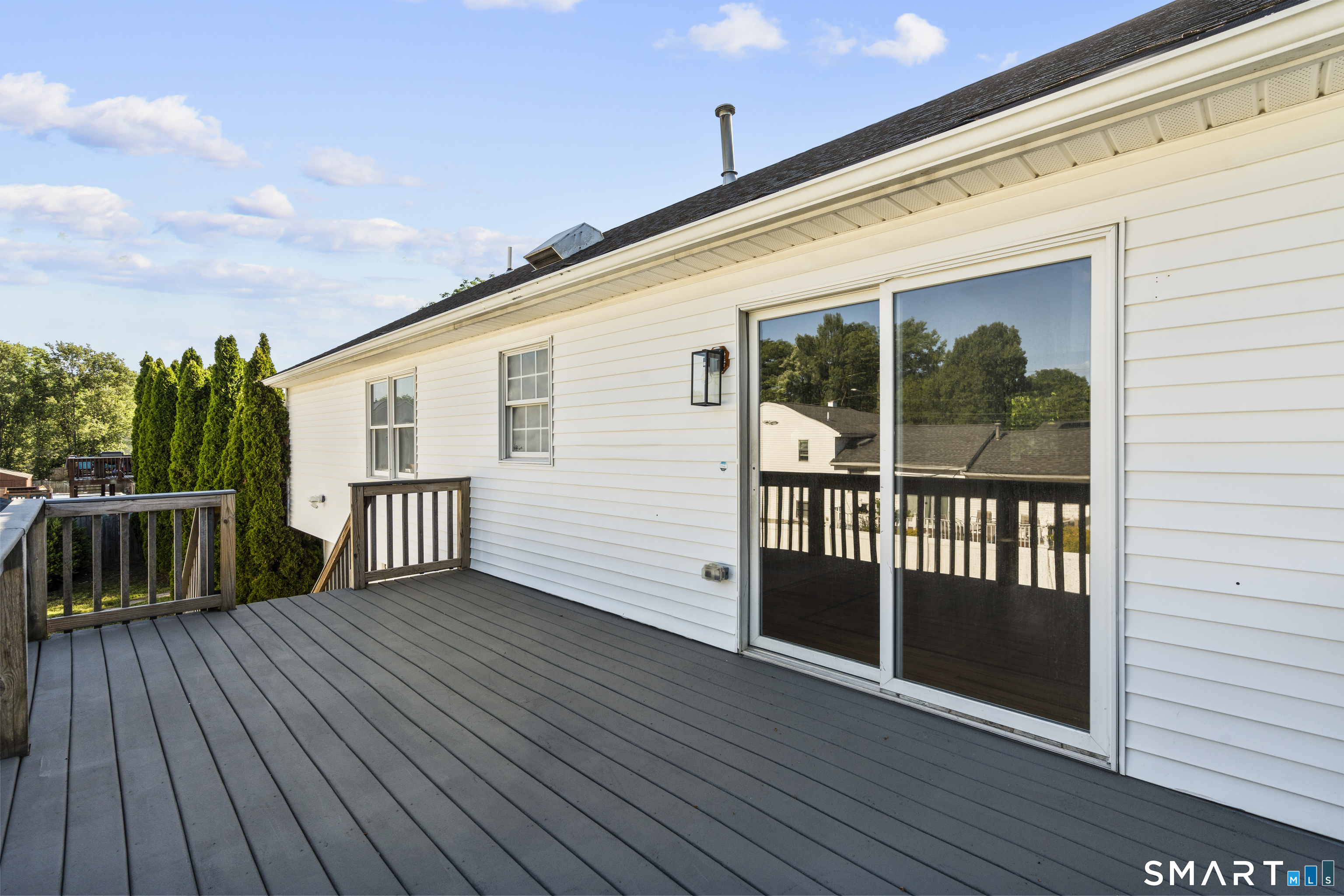39 Joseph Lane Hamden, CT 06514 - Photo 7 of 40 a view of backyard with deck and wooden floor