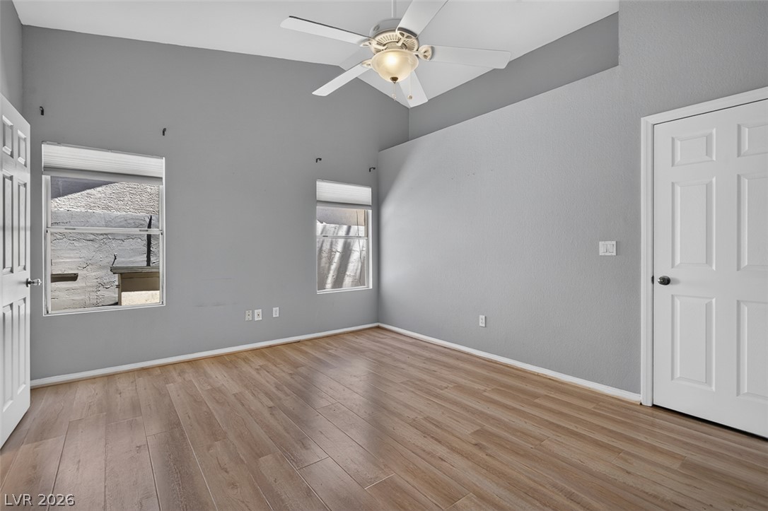 2609 Shakespeare Road Las Vegas, NV 89108 - Photo 18 of 41 Vast hardwood flooring defines this generously sized sleeping area, ready for your personalized touch.