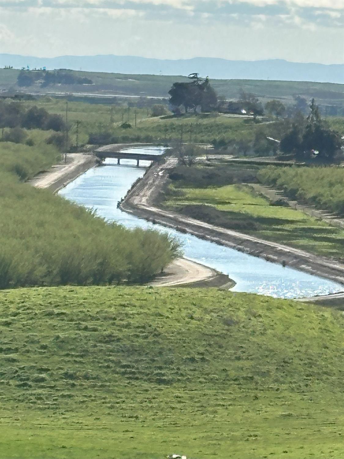 1100 Crabtree Road Waterford, CA 95386 - Photo 68 of 73 a view of a lake with a mountain