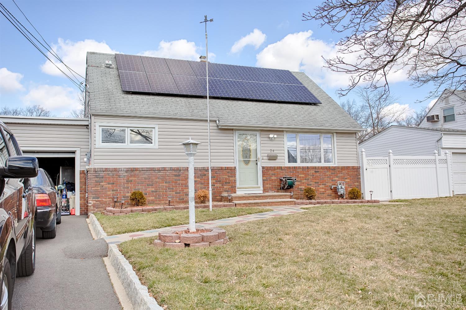 24 Longfield Road New Brunswick, NJ 08901 - Photo 1 of 27 a view of a house with a patio