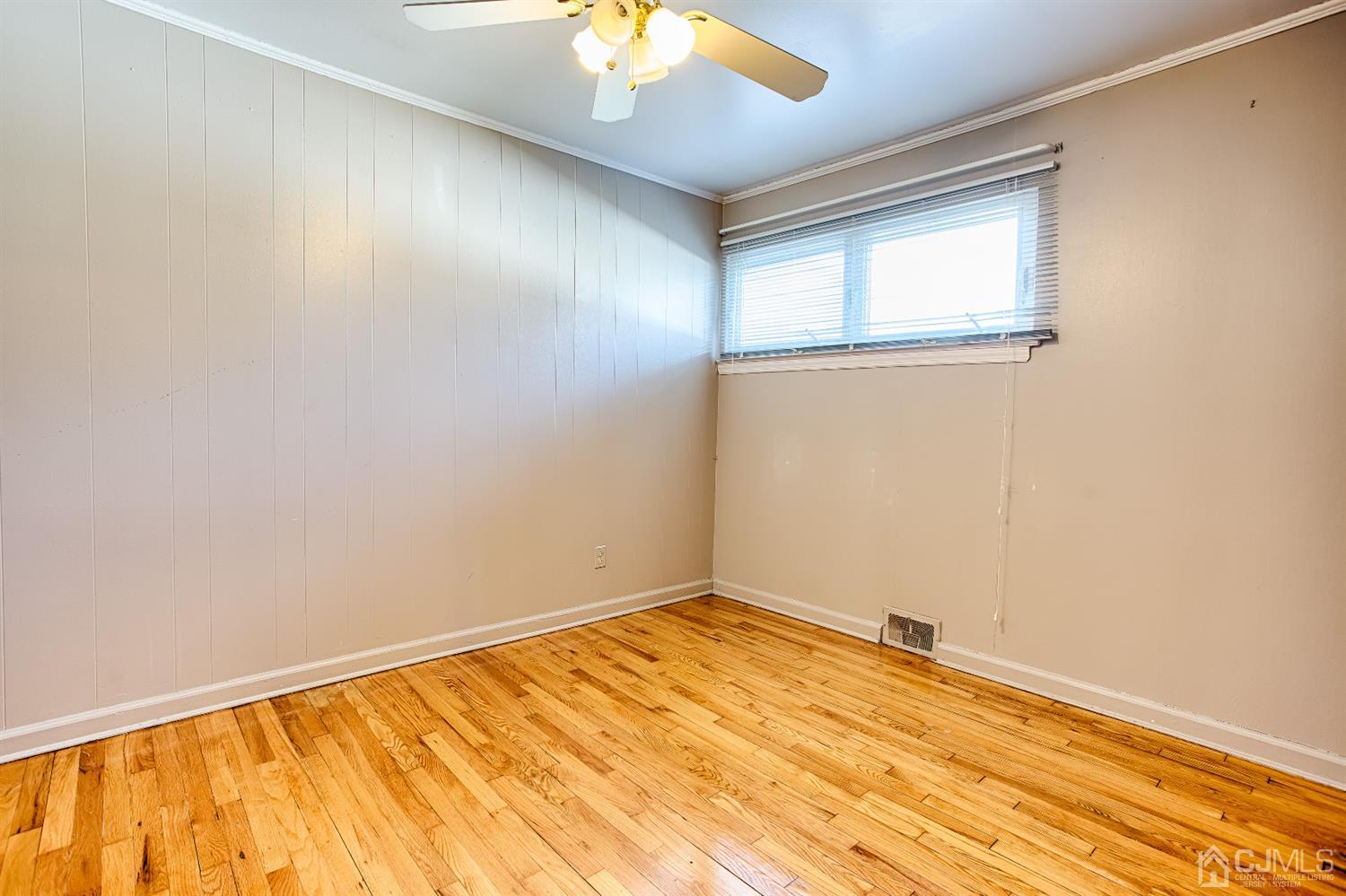 24 Longfield Road New Brunswick, NJ 08901 - Photo 11 of 27 an empty room with a window