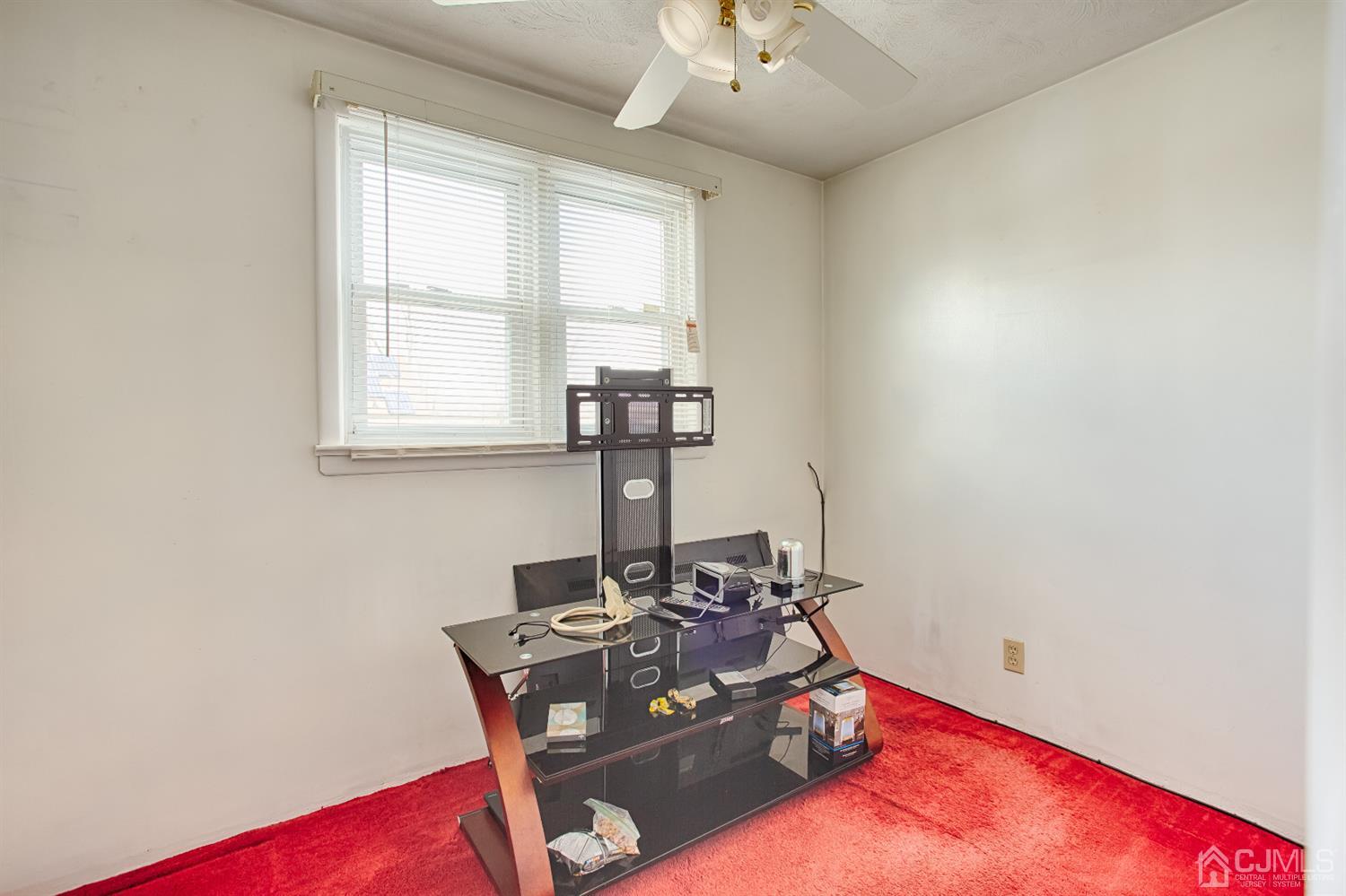 24 Longfield Road New Brunswick, NJ 08901 - Photo 15 of 27 a room with furniture and window