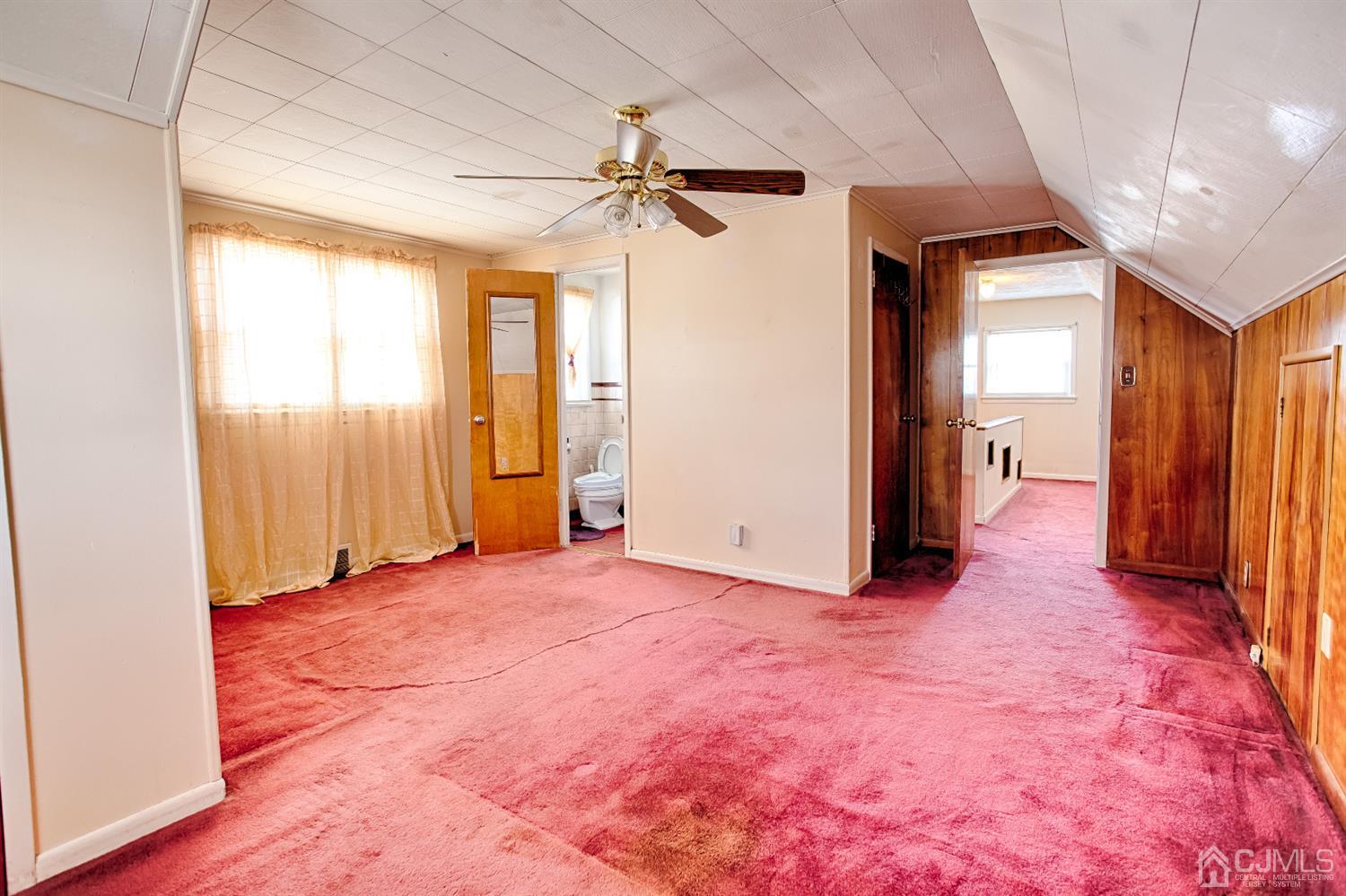 24 Longfield Road New Brunswick, NJ 08901 - Photo 17 of 27 a view of empty room with window and ceiling fan