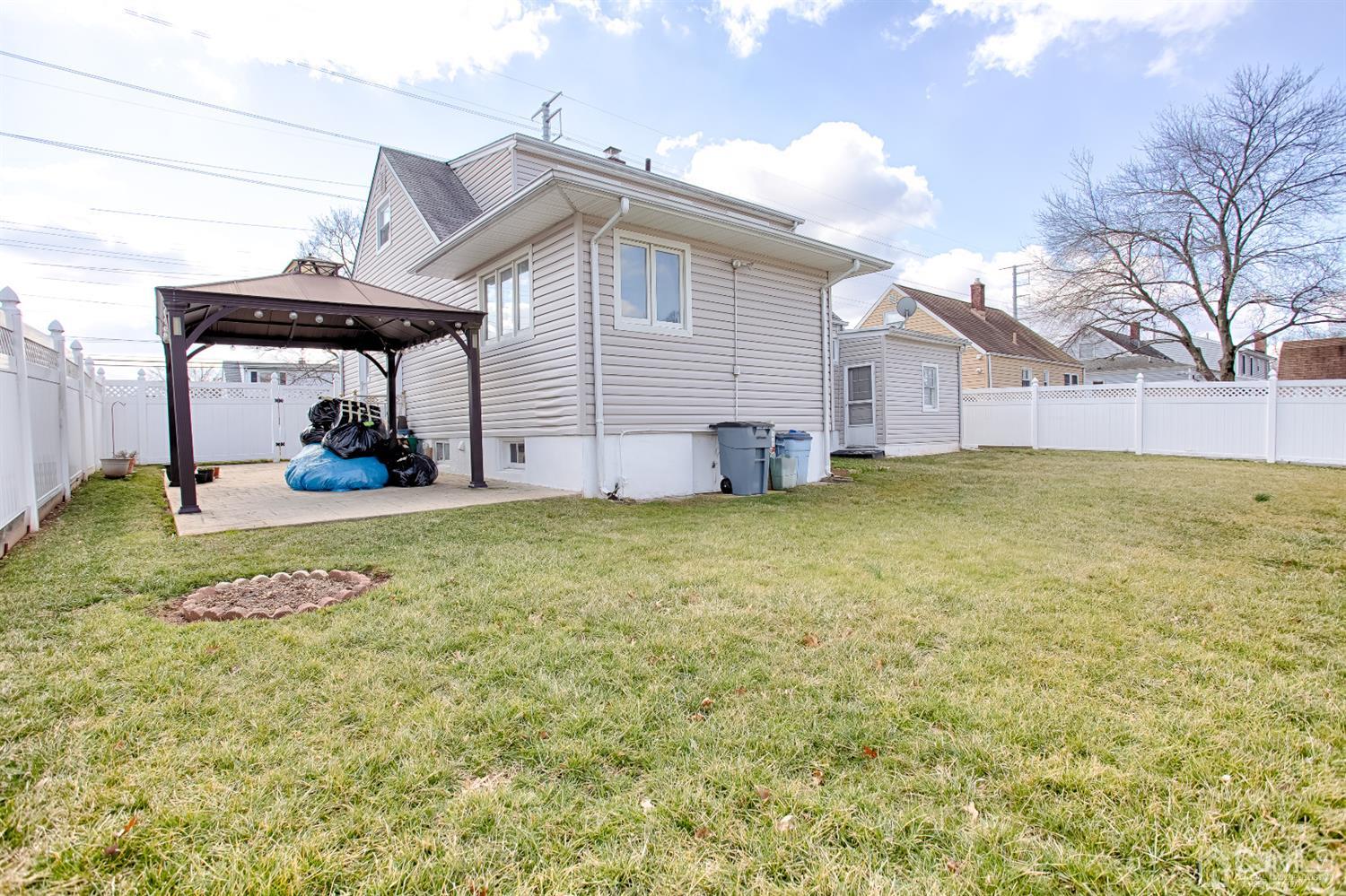 24 Longfield Road New Brunswick, NJ 08901 - Photo 26 of 27 a view of a house with a yard
