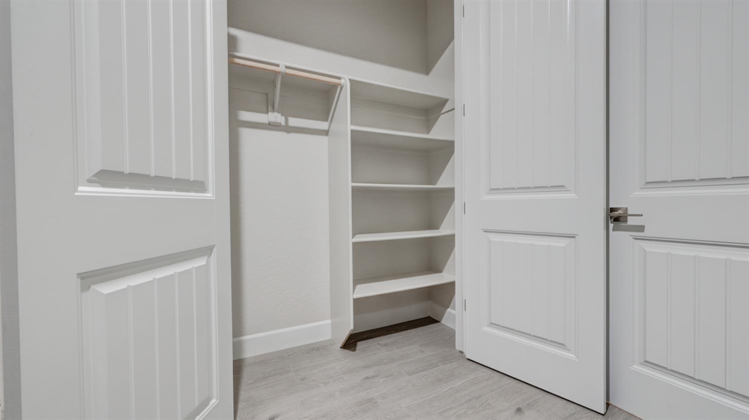 935 Talus Way Madera, CA 93636 - Photo 23 of 34 a view of an empty walk in closet