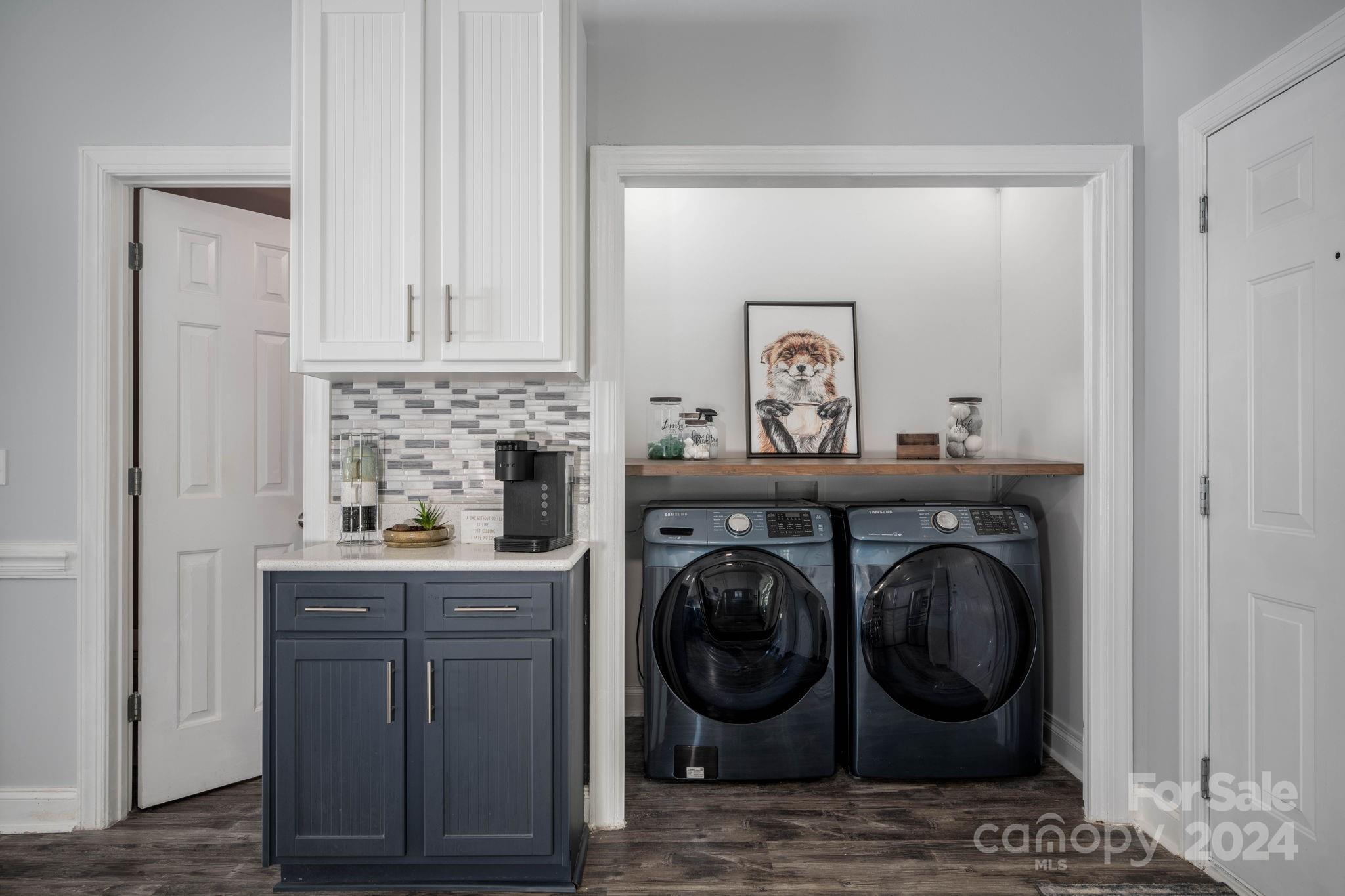 147 High Ridge Road Mooresville, NC 28117 - Photo 15 of 30 a view of a storage and utility room with washer and dryer