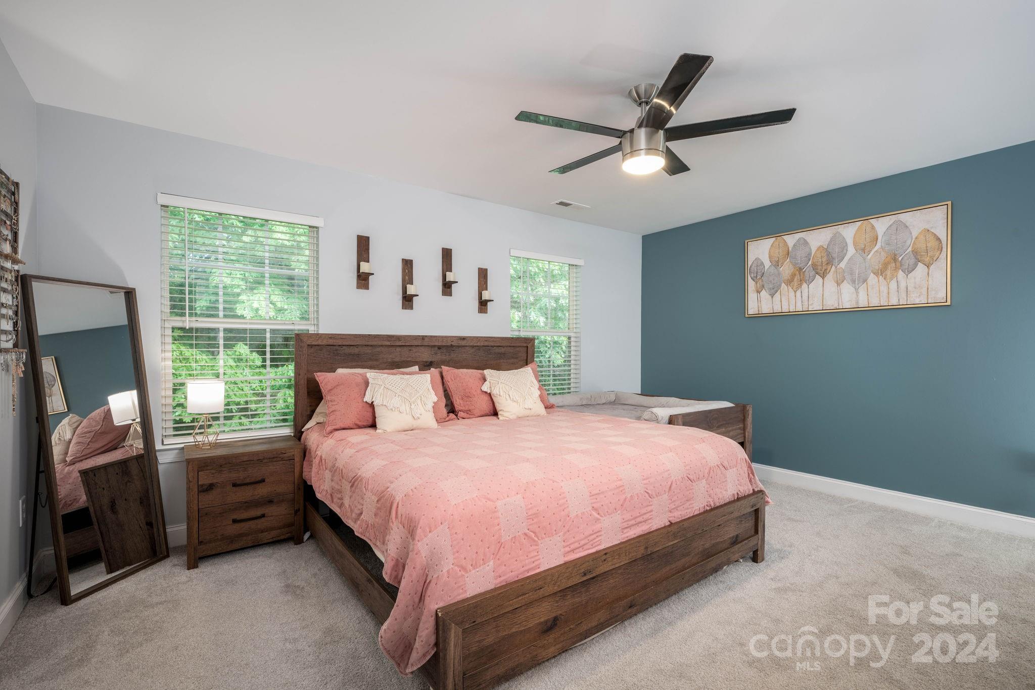 147 High Ridge Road Mooresville, NC 28117 - Photo 17 of 30 a bedroom with a bed and a window