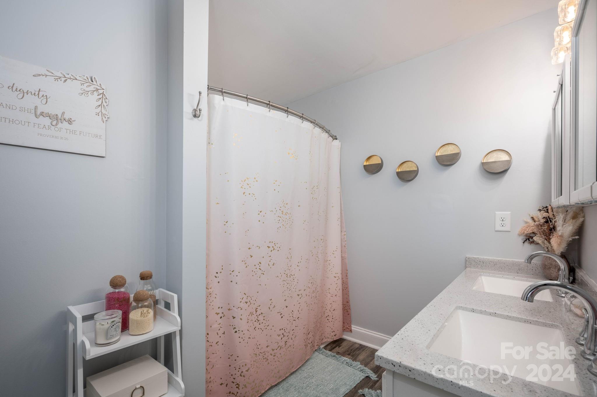 147 High Ridge Road Mooresville, NC 28117 - Photo 19 of 30 a bathroom with a tub and sink
