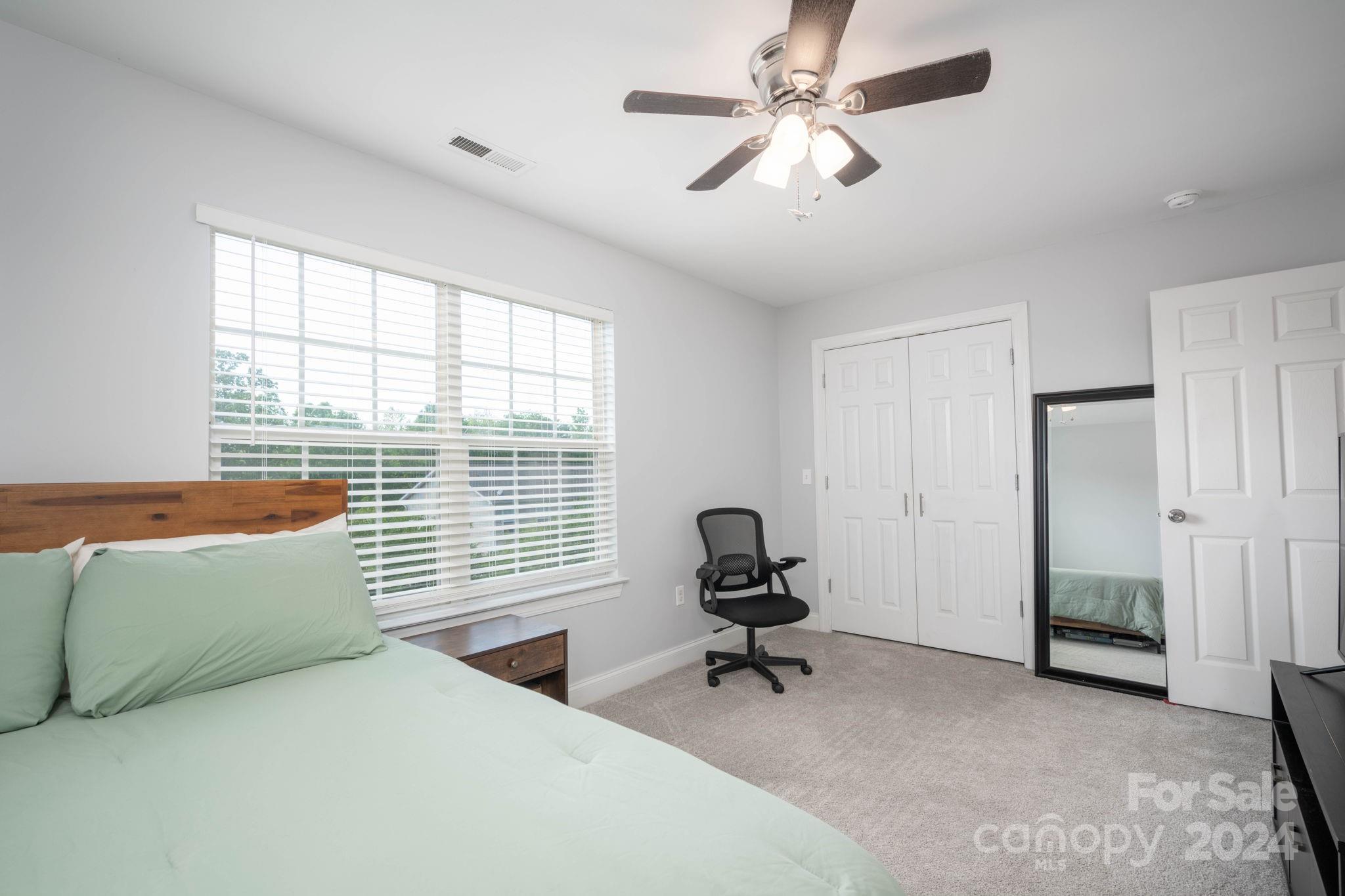 147 High Ridge Road Mooresville, NC 28117 - Photo 23 of 30 a bedroom with furniture and a window