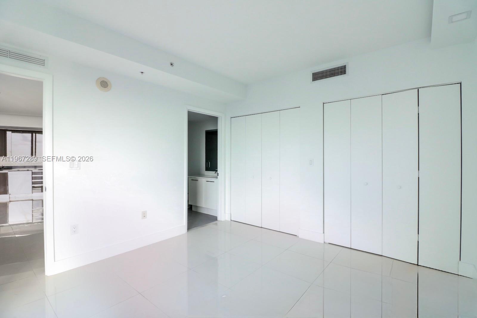 92 Southwest 3rd Street, Unit 2706 Miami, FL 33130 - Photo 3 of 13 a view of an empty room