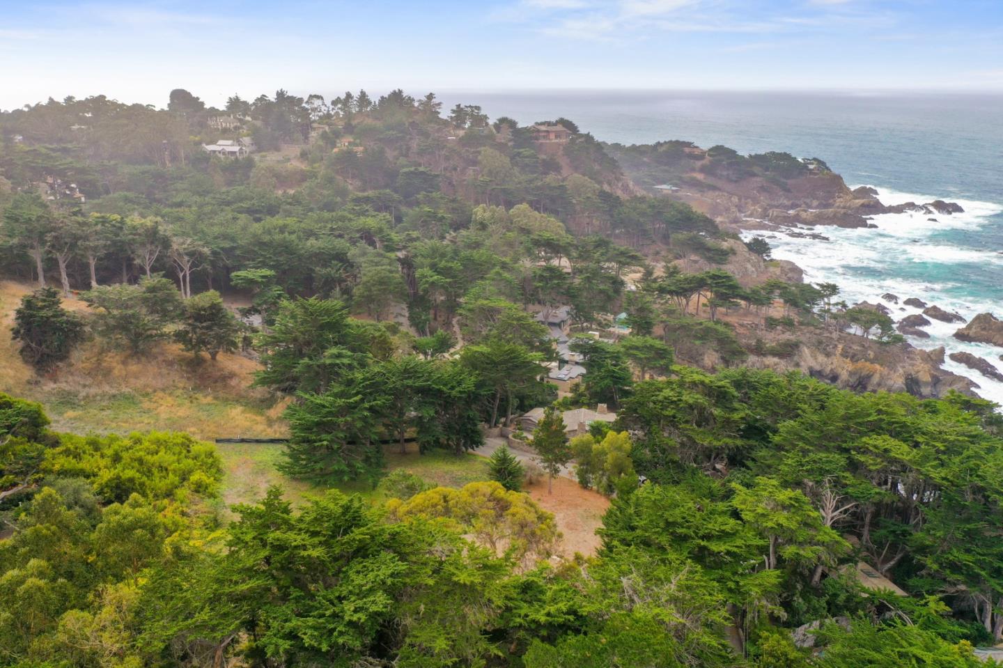 161 Spindrift Road, Unit B Carmel, CA 93923 - Photo 5 of 22 a view of a houses with a yard and mountain