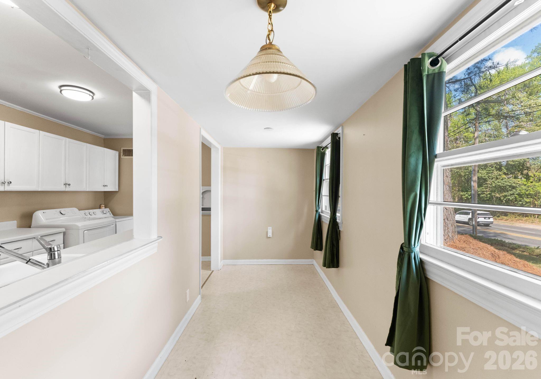 1136 East Woodlawn Road Charlotte, NC 28209 - Photo 16 of 47 a very nice looking room with a large window