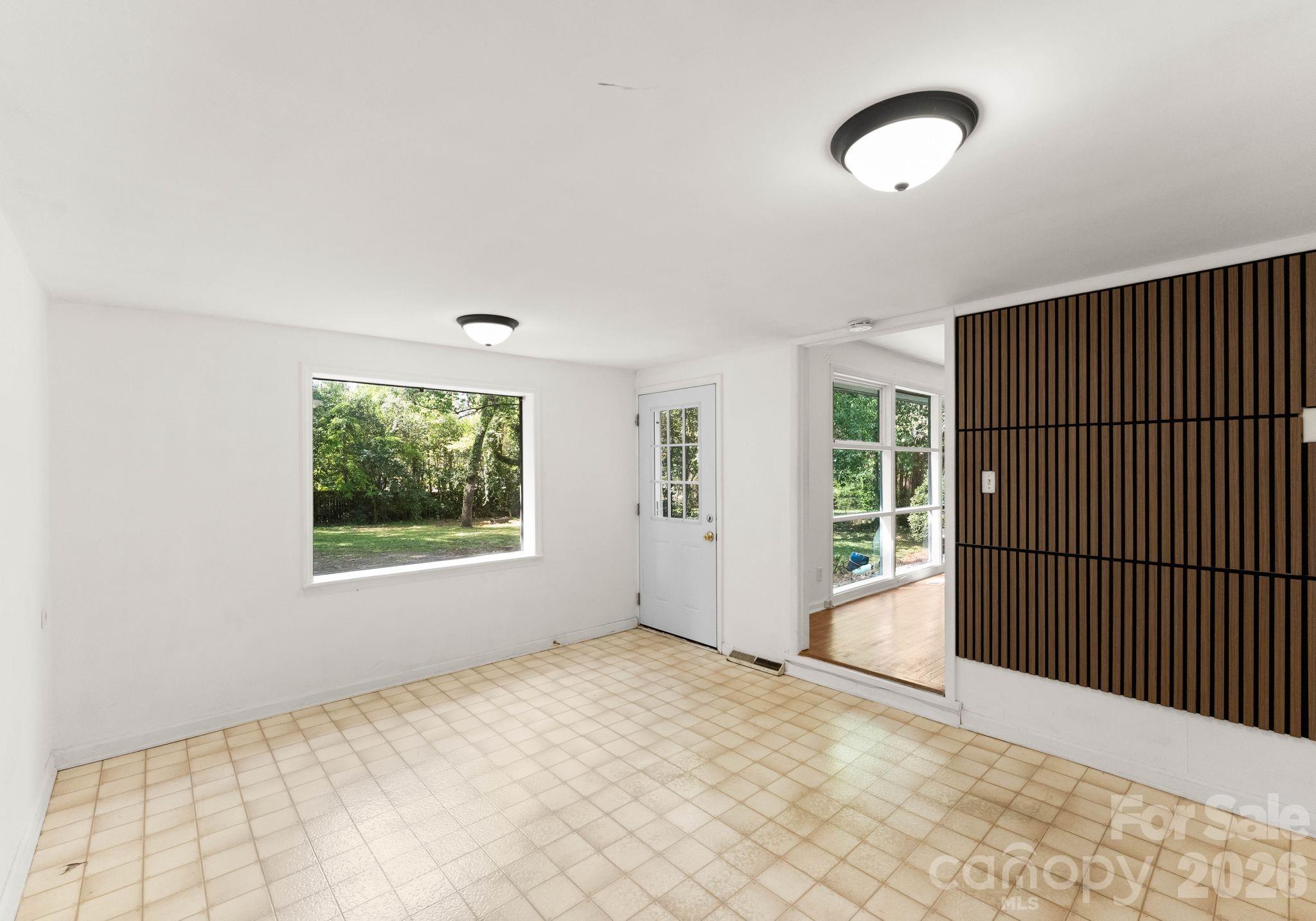 1136 East Woodlawn Road Charlotte, NC 28209 - Photo 23 of 47 a view of an empty room with a window