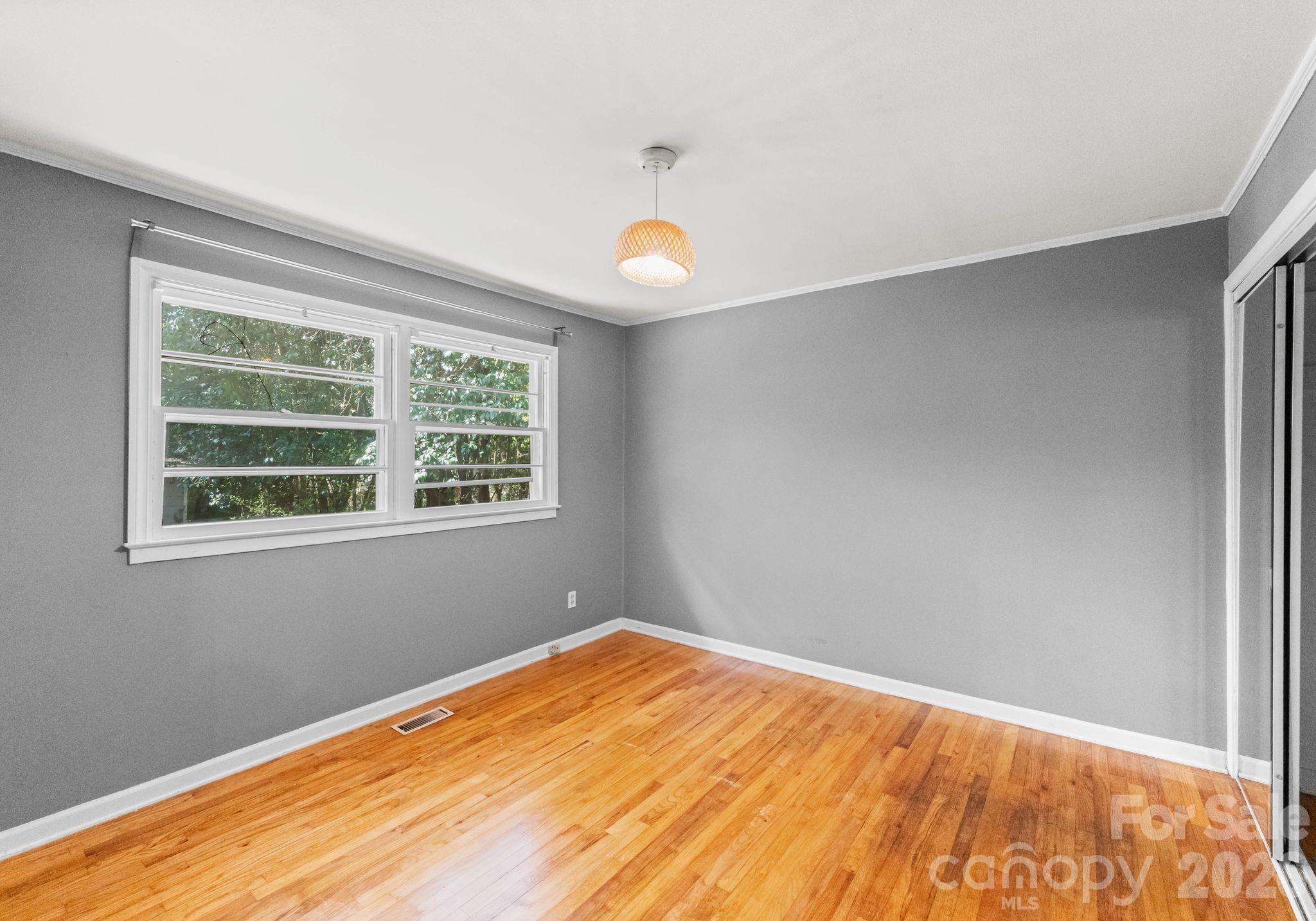 1136 East Woodlawn Road Charlotte, NC 28209 - Photo 30 of 47 a view of empty room with window