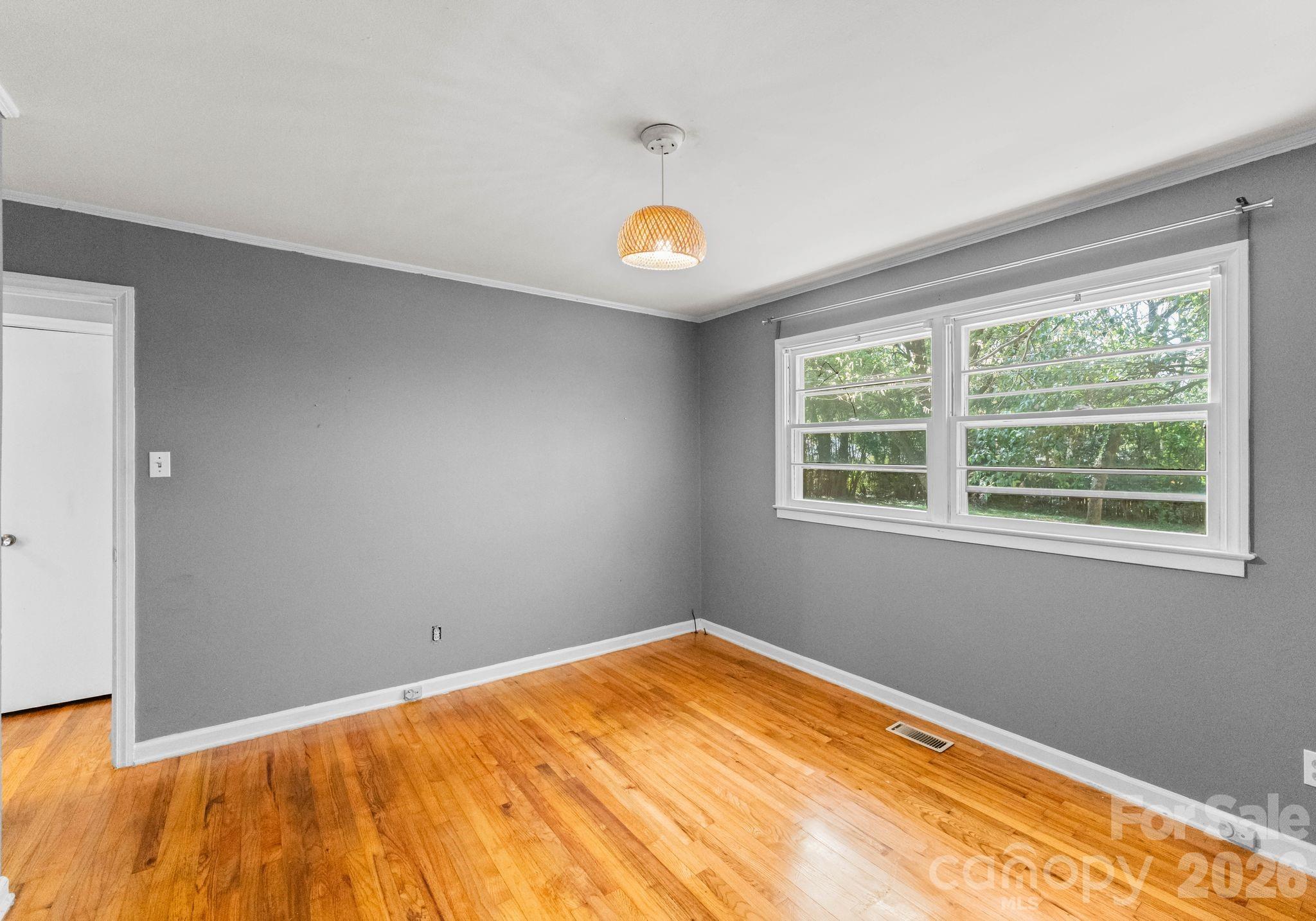 1136 East Woodlawn Road Charlotte, NC 28209 - Photo 31 of 47 a view of a room that has a window
