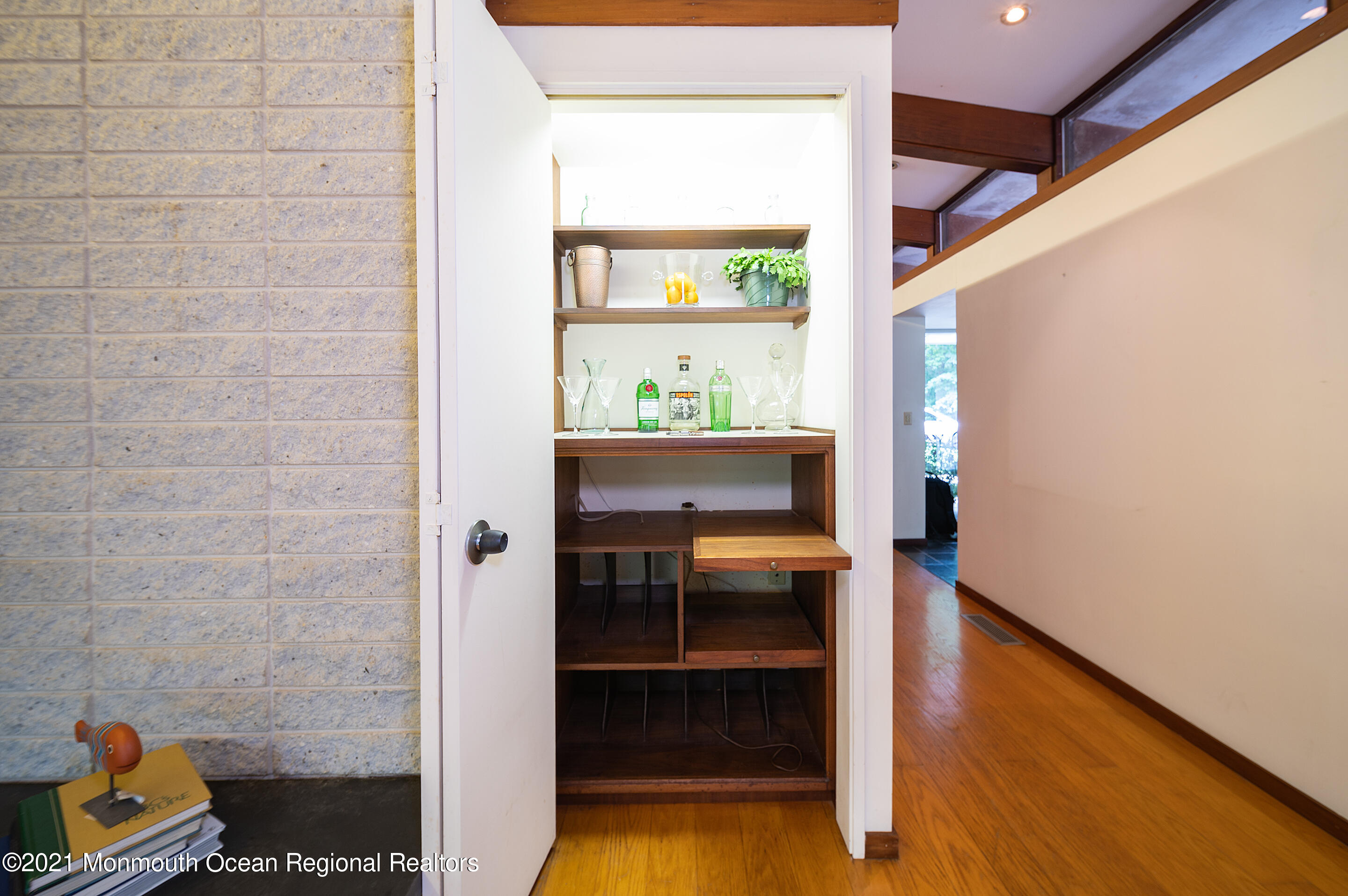 277 Mc Clees Road Red Bank, NJ 07701 - Photo 13 of 53 a room with wooden floor and a window