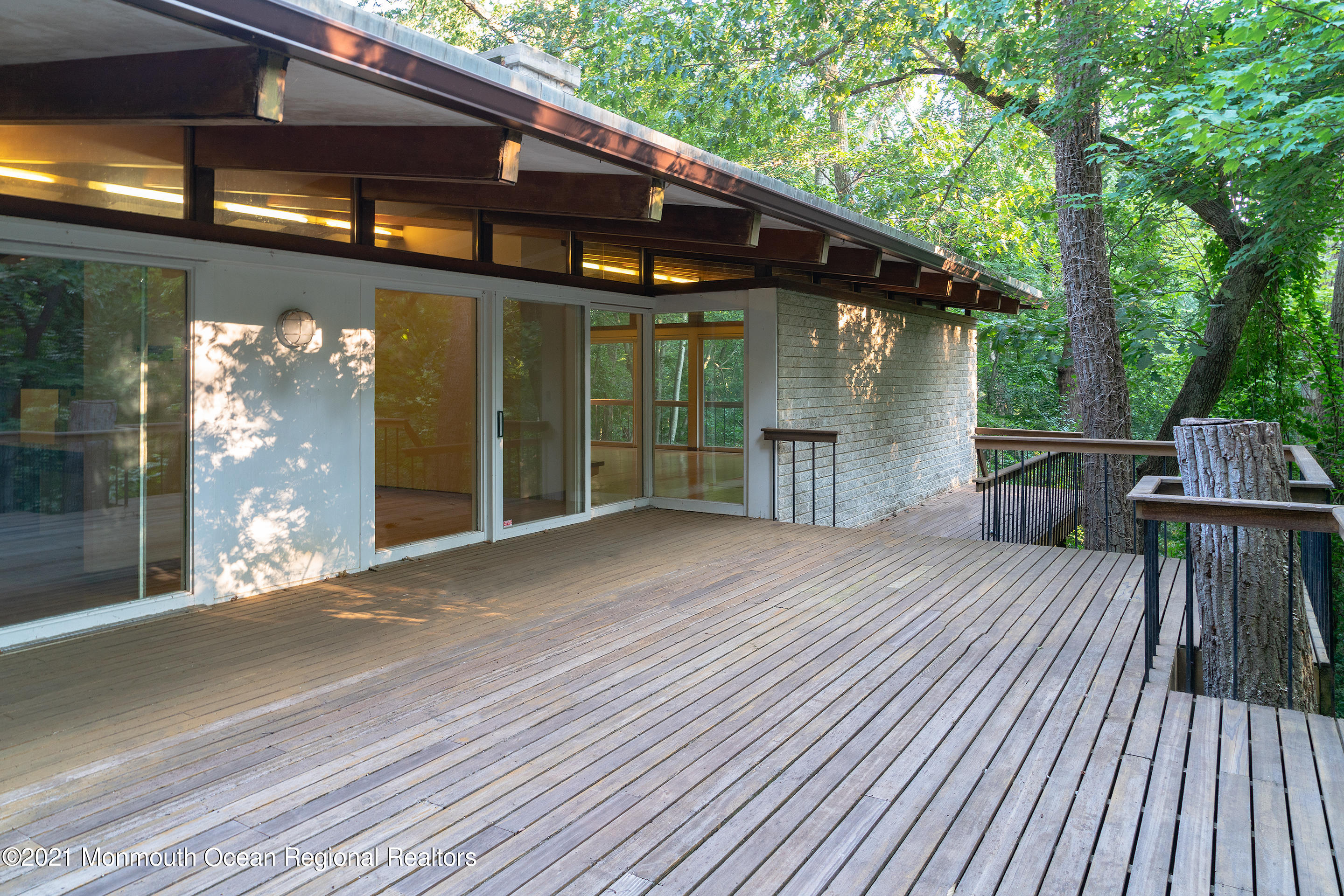 277 Mc Clees Road Red Bank, NJ 07701 - Photo 15 of 53 a view of a house with backyard and sitting area