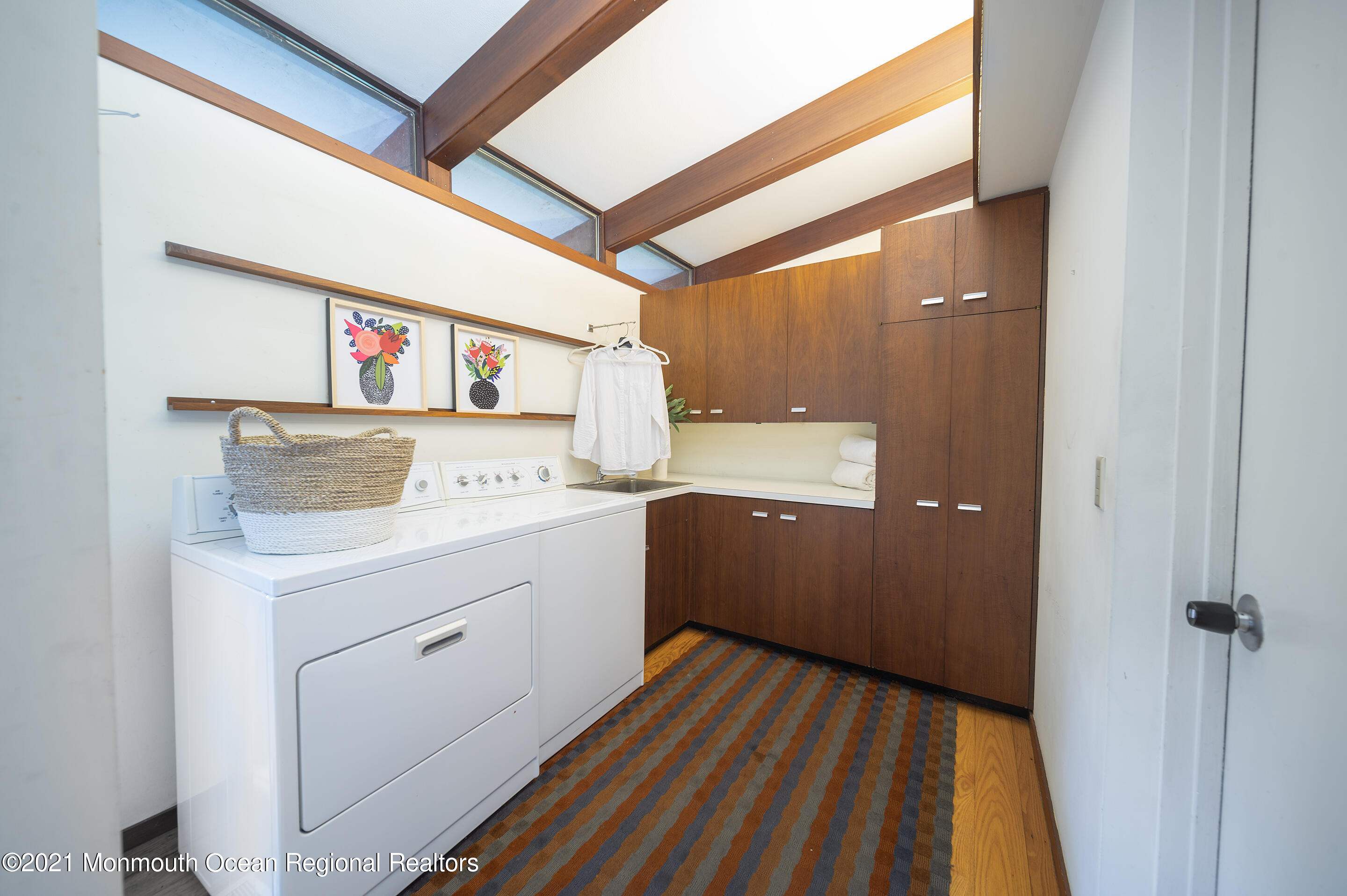 277 Mc Clees Road Red Bank, NJ 07701 - Photo 33 of 53 a view of washer and dryer with bathtub