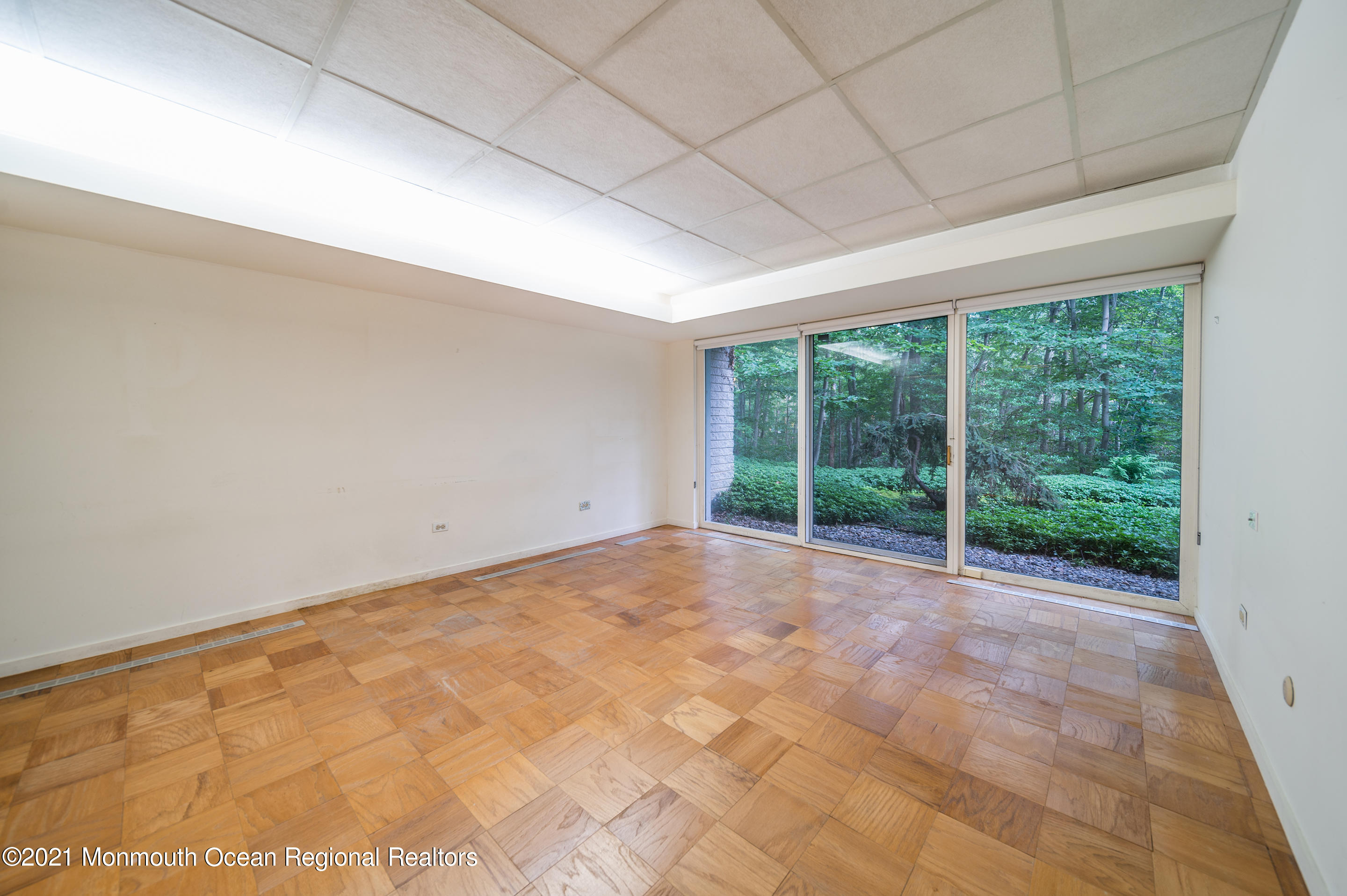 277 Mc Clees Road Red Bank, NJ 07701 - Photo 37 of 53 a view of an empty room with a window